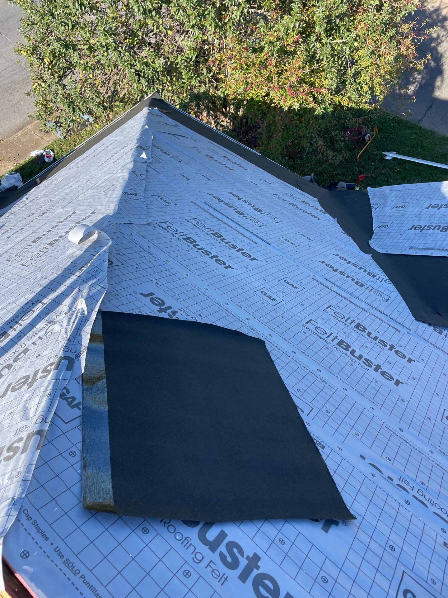 Residential Roofing Installation using GAF Timberline HDZ Charcoal by Rainstoppers Roofing