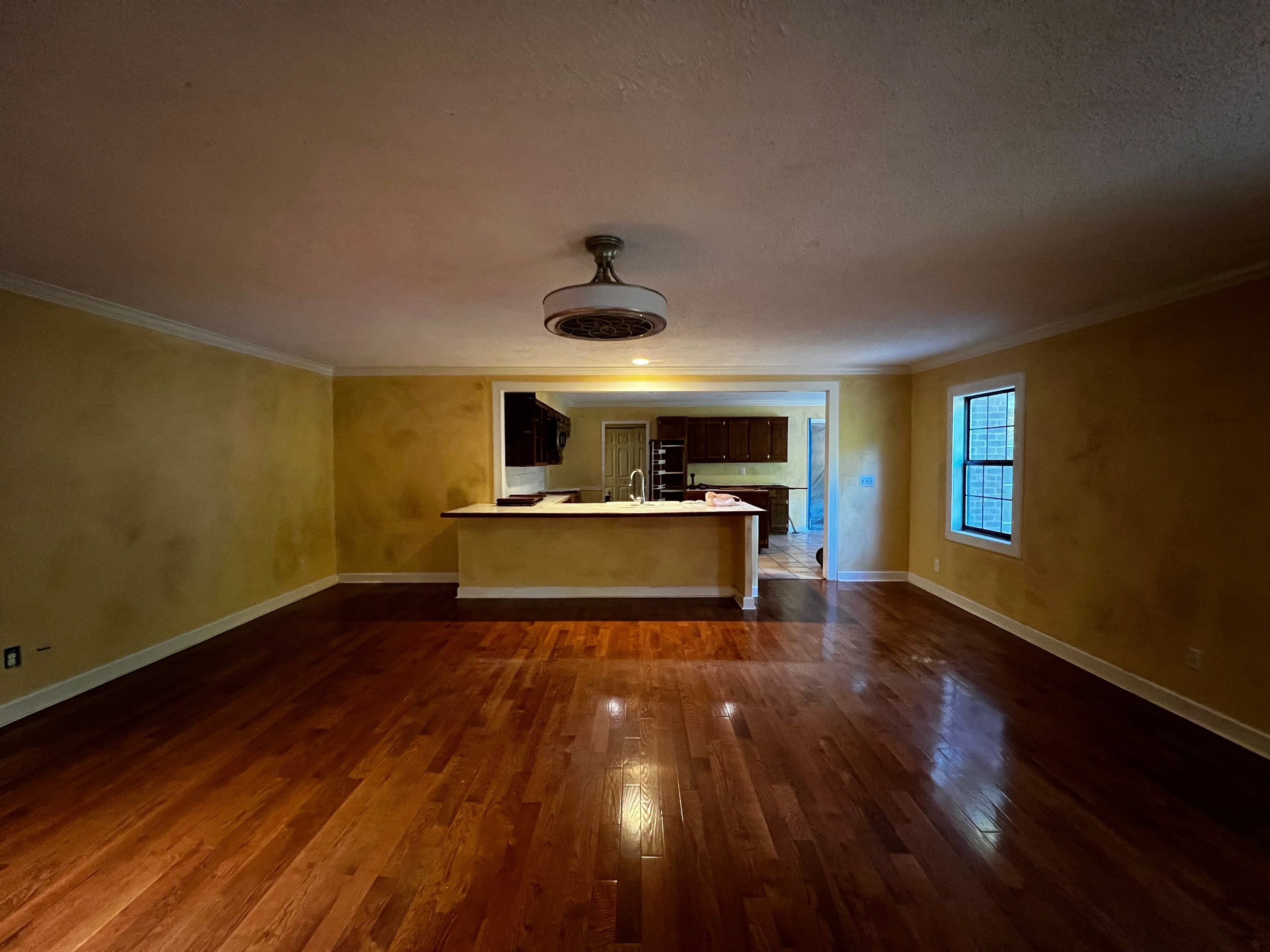 Kitchen and Living Area Renovation Featuring Hardwood Flooring in Smyrna by Swift Home Renovations