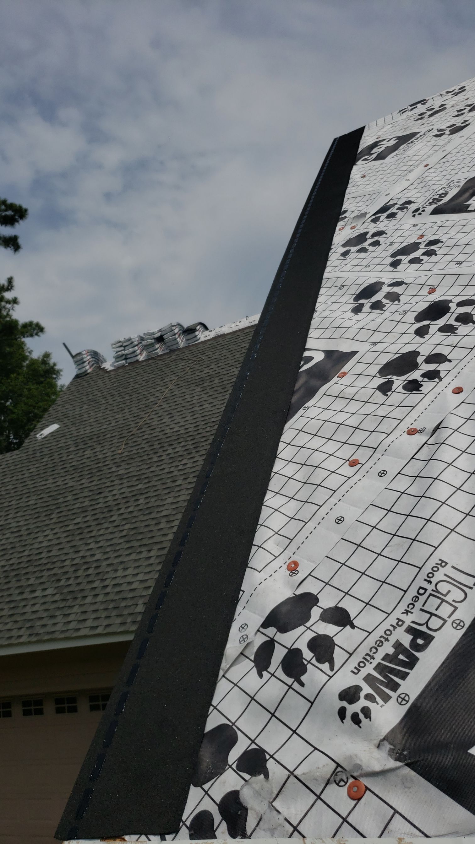 Residential Roofing Installation using Roof Replacement by American Roofing & Construction LLC