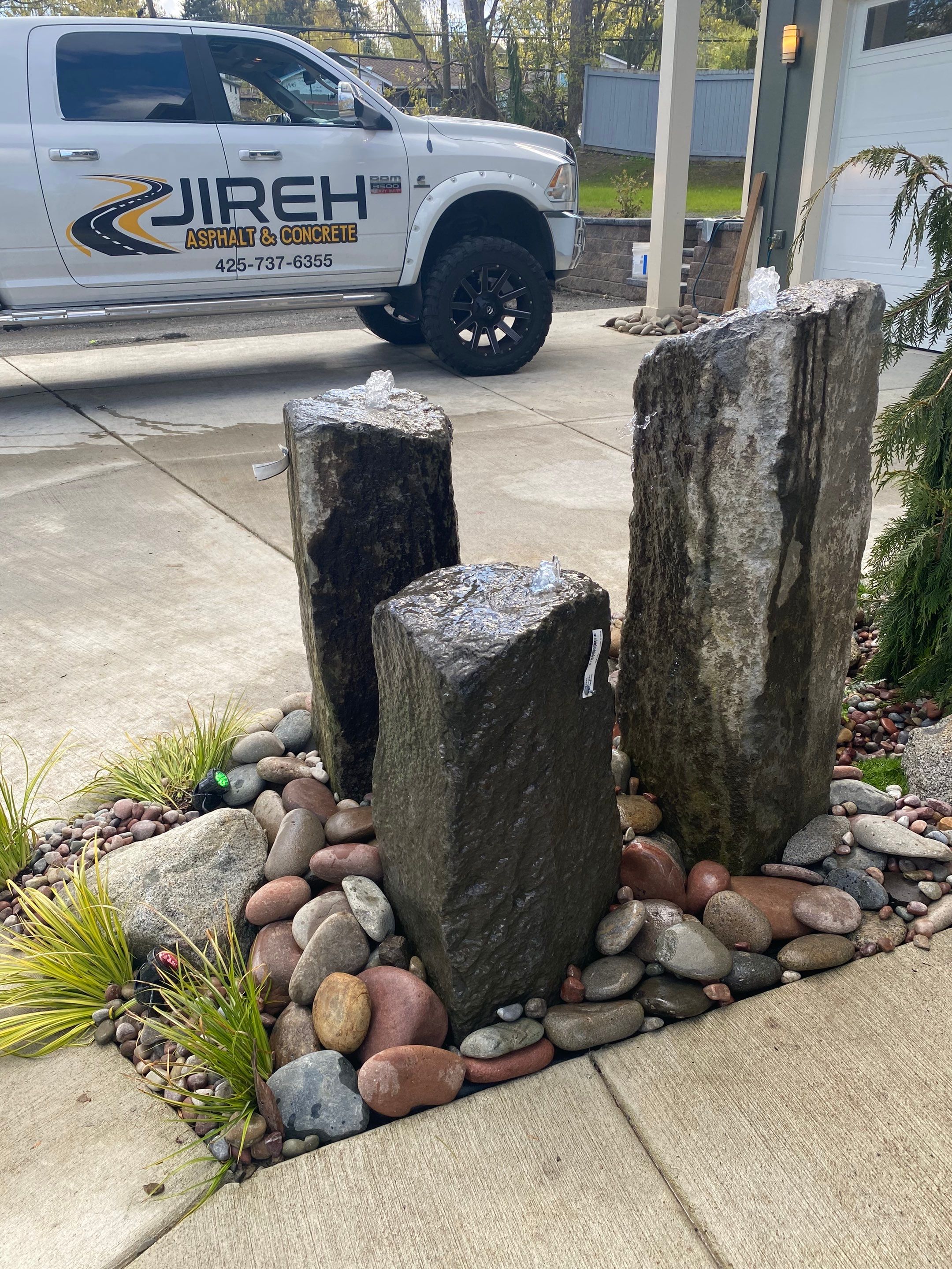 Patio Installation using Concrete, Retaining walls, and Turf install by Jireh Asphalt & Concrete Inc 
