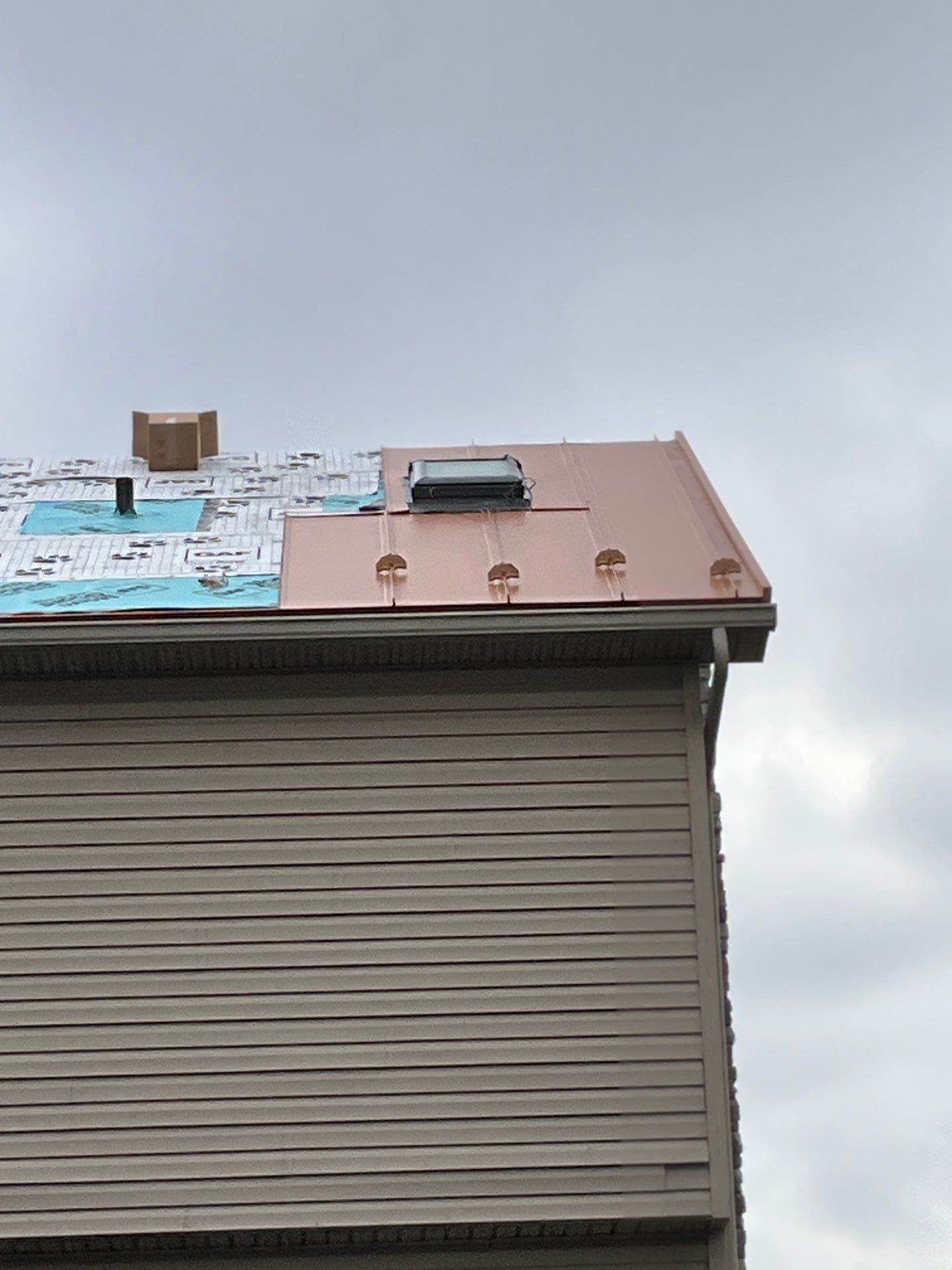 Standing Seam Roof – Copper Finish by Esh Builders