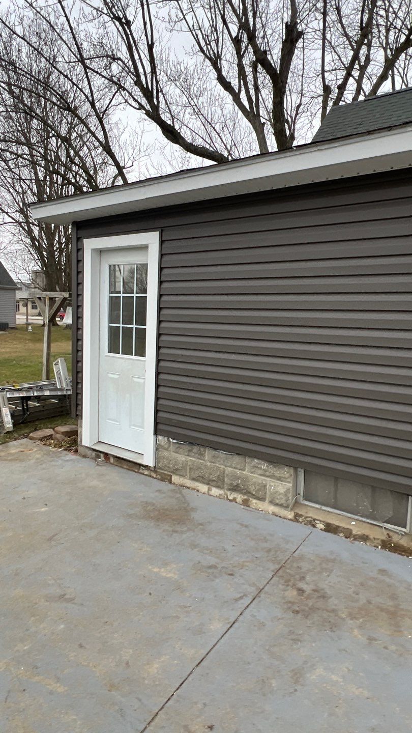 Residential fascia replacement using Exterior Portfolio 4.5 DL - Peppercorn by Nitro Roofing and Construction
