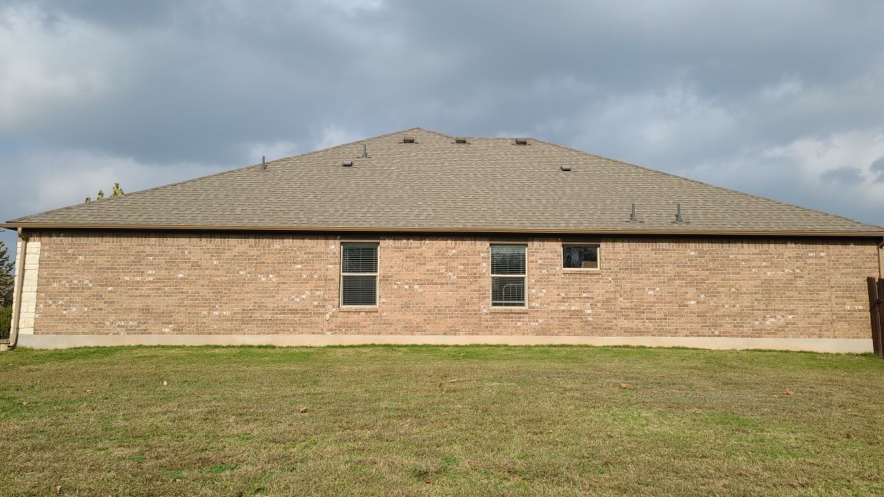 Residential Roof Replacement with Oakridge Asphalt Shingles in Leander by Caliber Restoration LLC