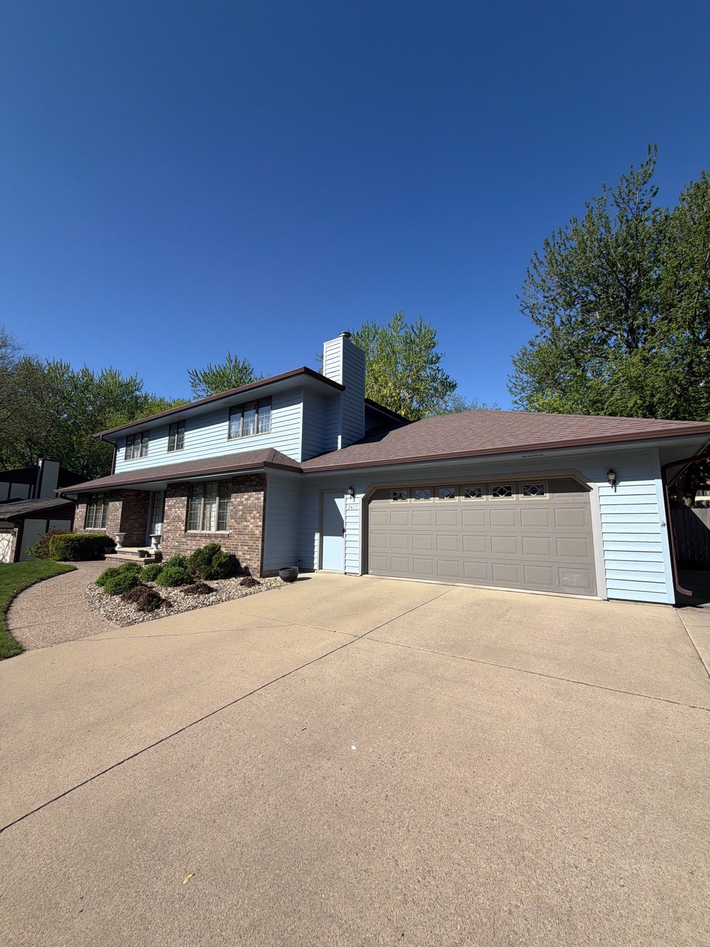 Full Exterior Home Painting and Siding Refurbishment in Sioux Falls by Select Painting, Coatings & Garage Cabinets
