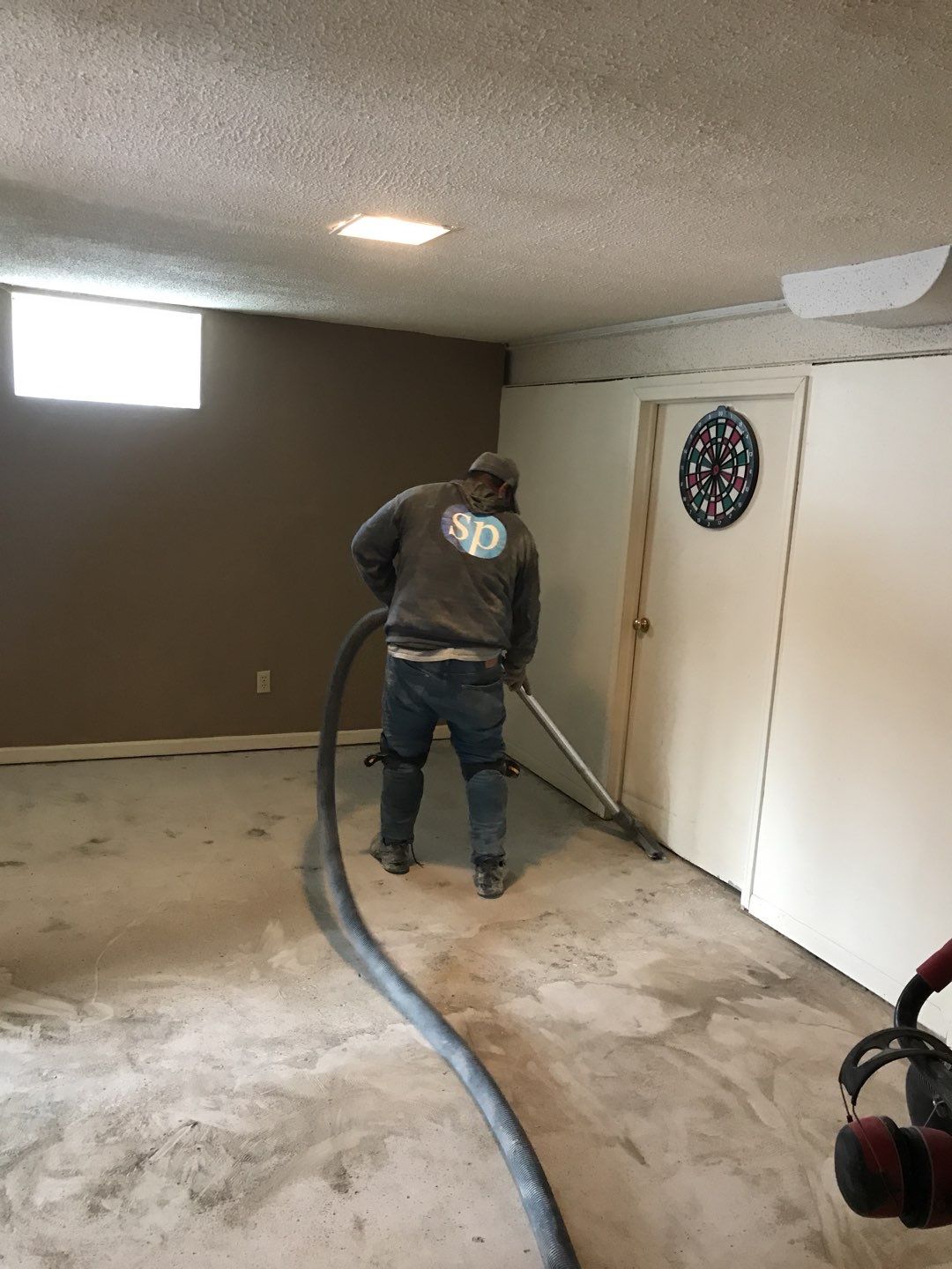Basement using Driftwood by Select Painting, Coatings & Garage Cabinets