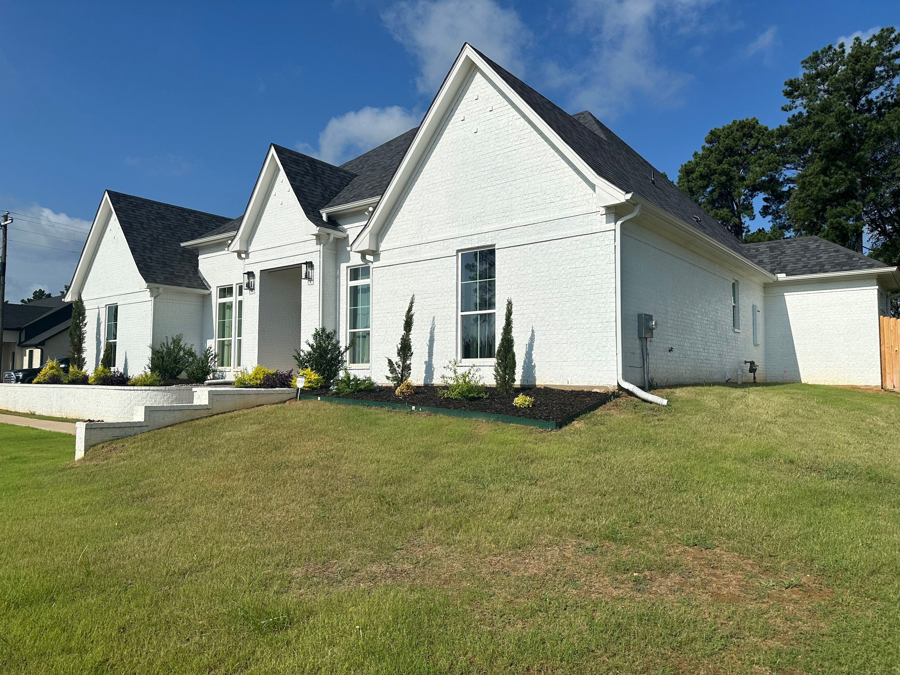 Exterior Painting in Longview, TX | Roof & Eaves in Elegant Black by Quality Coats Painting