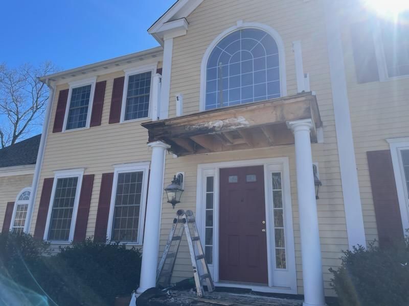 Porch Replacement in Holliston, MA by Master Roof Inc