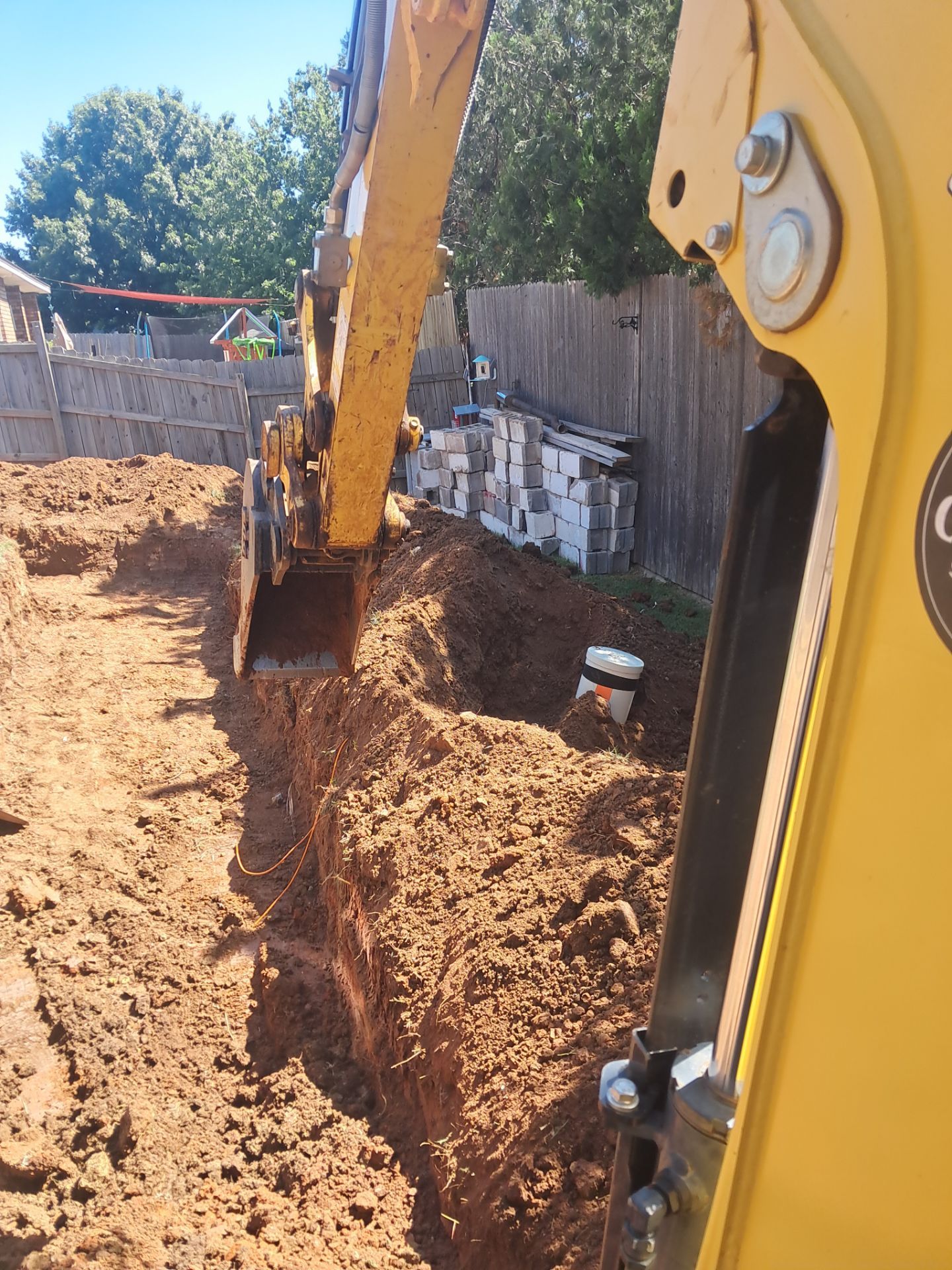 Custom Segmental Block Retaining Wall and Sod Installation in Lawton by Clays Services Inc