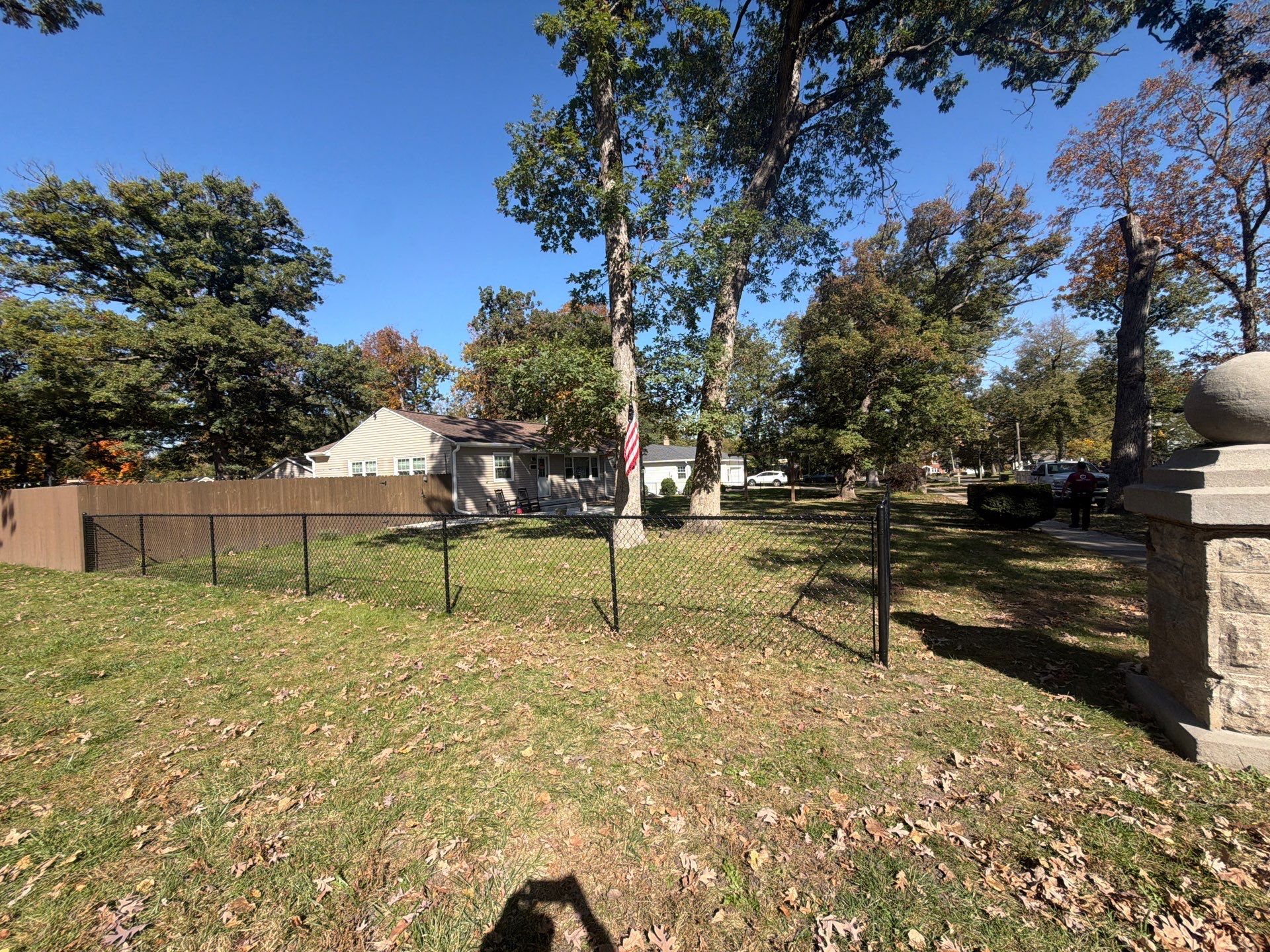 Residential Black Chain Link Fencing in Cedar Falls by Perfect Picket Fence and Stain