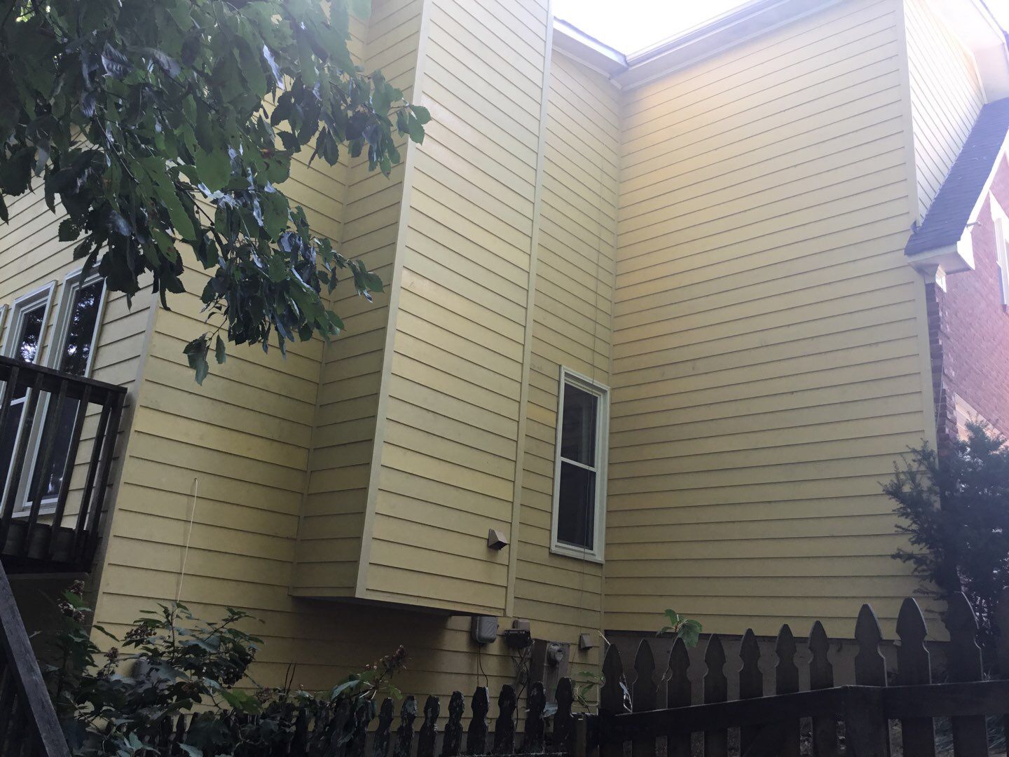 Multi-Story Vinyl Siding Replacement and Moisture Barrier Installation in Marietta by Swift Home Renovations