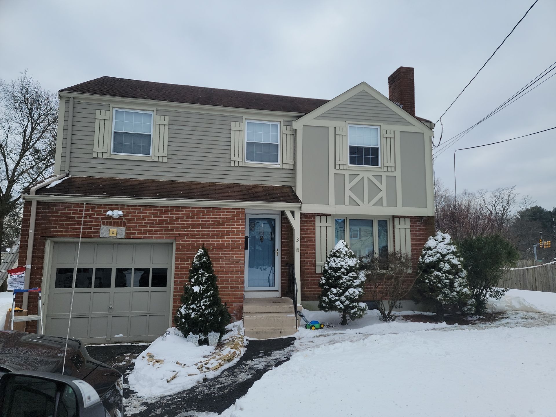 James Hardie siding, new metal roof and couple windows being installed. by UBrothers Construction