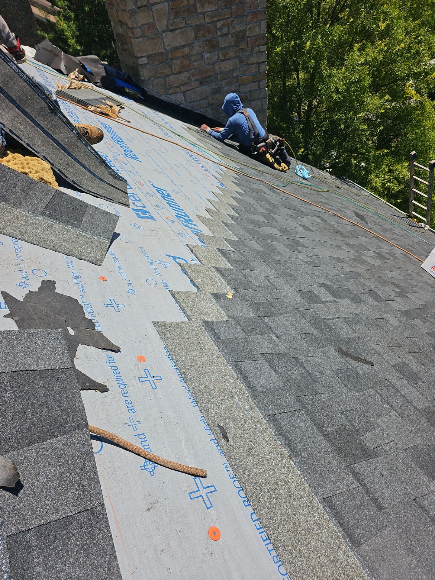 Roof Replacement - Moire Black by Winchester Roofing