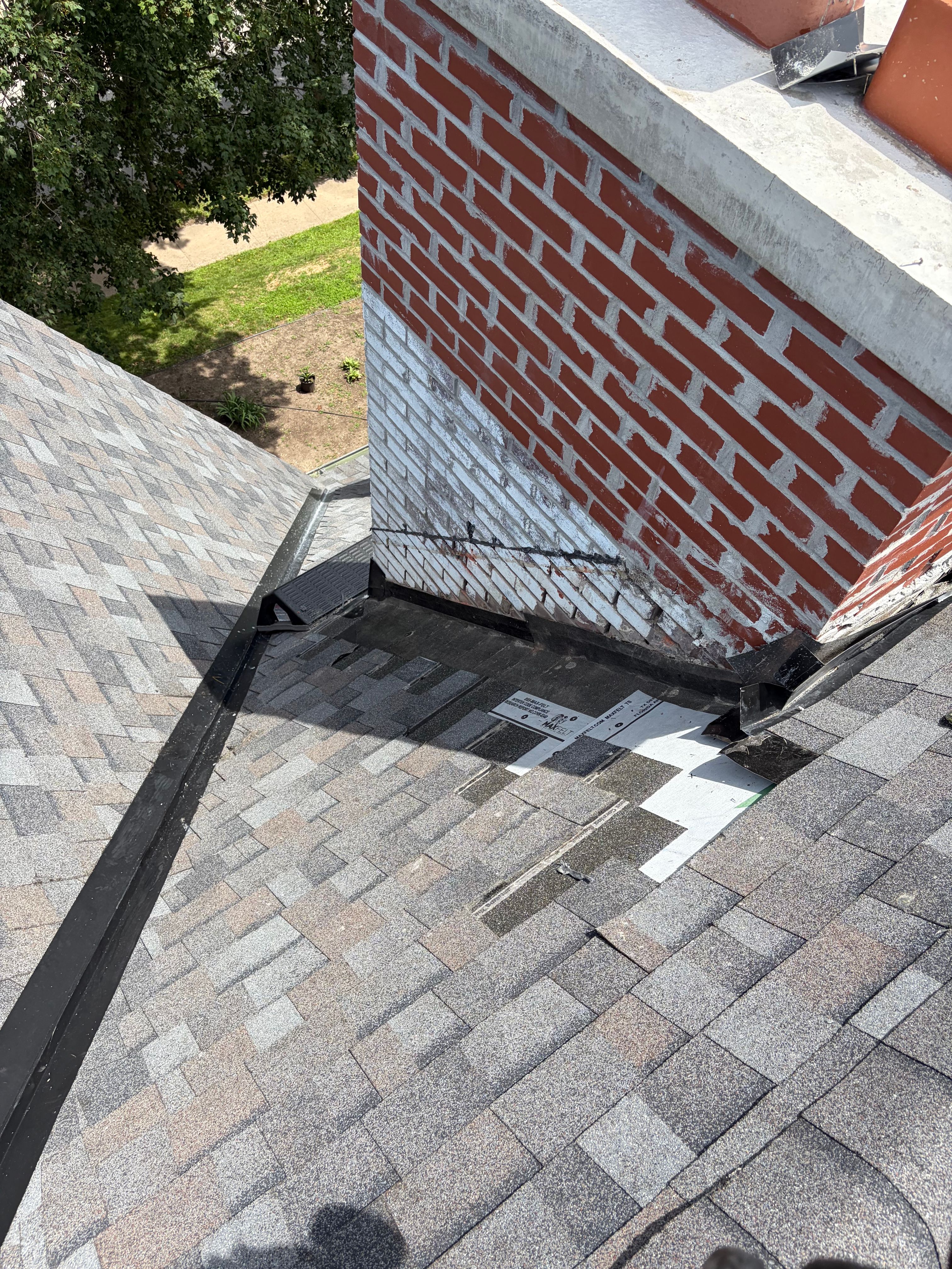 Brick Chimney Flashing and Roof Repair in Kansas City by Summit Roofing
