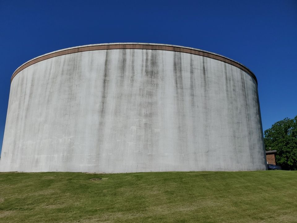 Water tank cleaning by Northern Power Washing LLC.