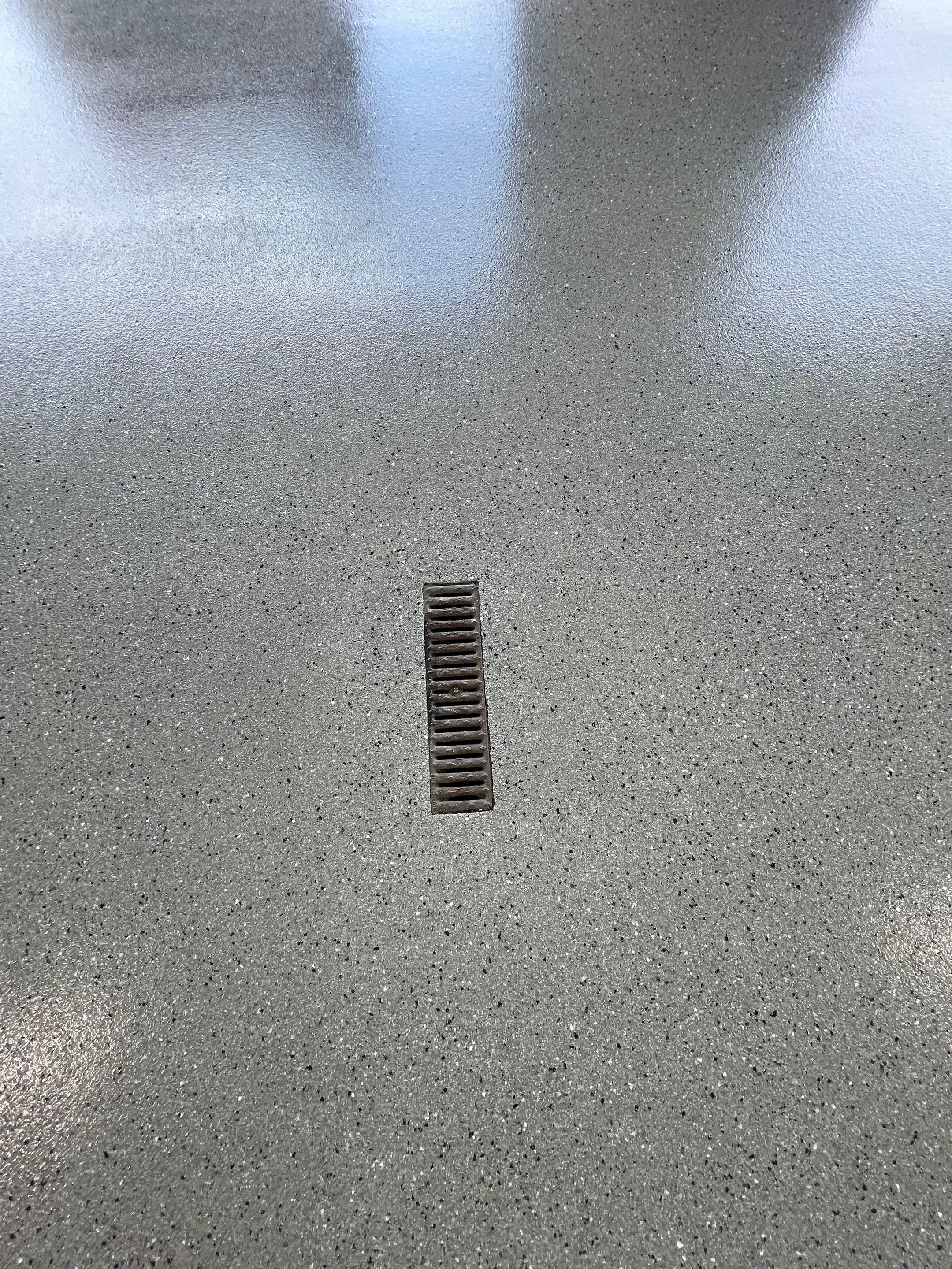Residential Garage Floor Coating with Grey Speckled Epoxy Finish by Select Painting, Coatings & Garage Cabinets