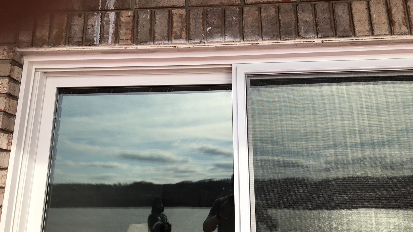 Deck Refurbush and Door Replacement using Trex Decking and Railing.  Polaris Patio Doors by Secure Construction Company Inc