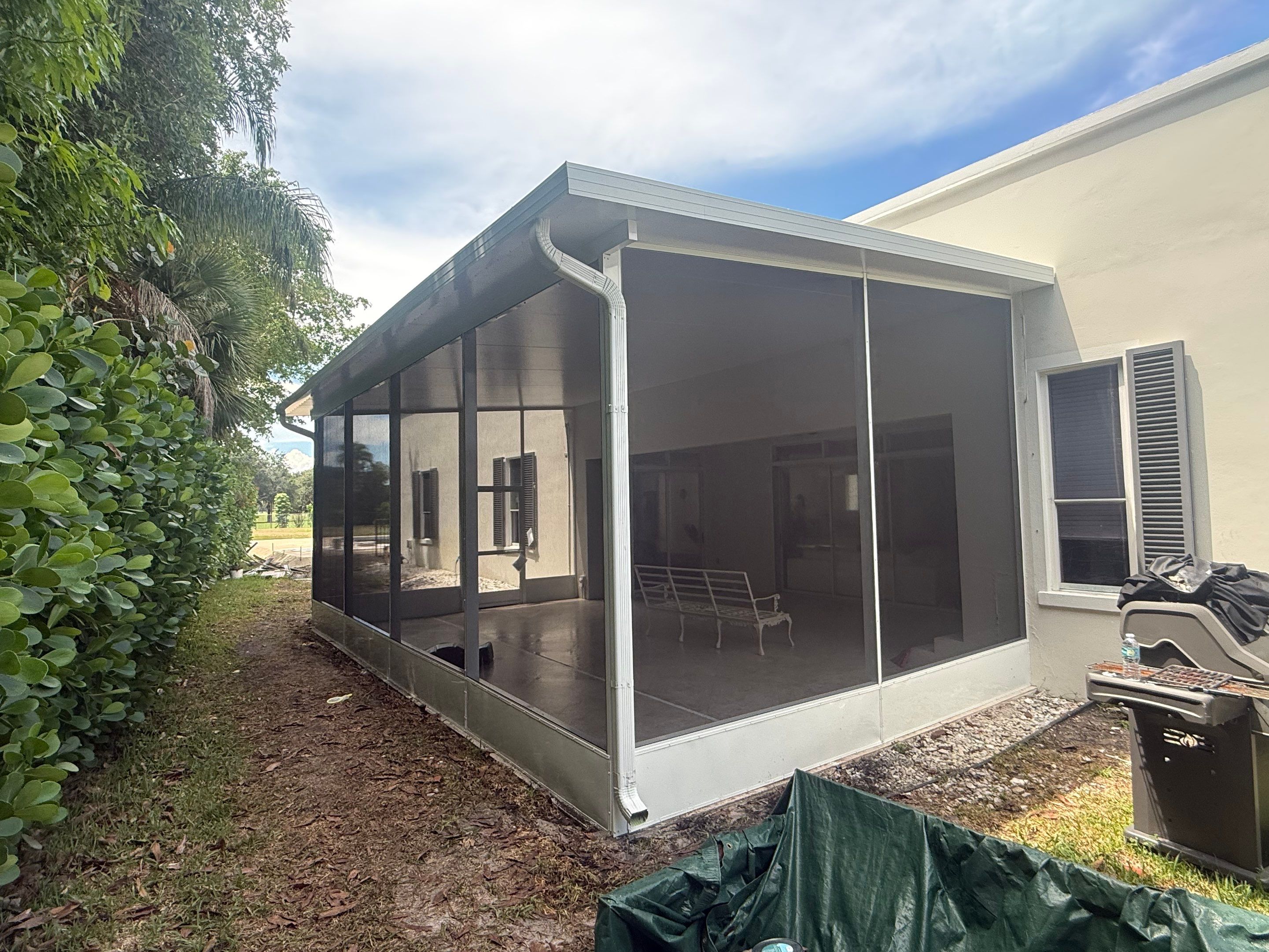 Aluminum Insulated Roof and Screen Enclosure Installation in Atlantis by The Screen Depot, Inc