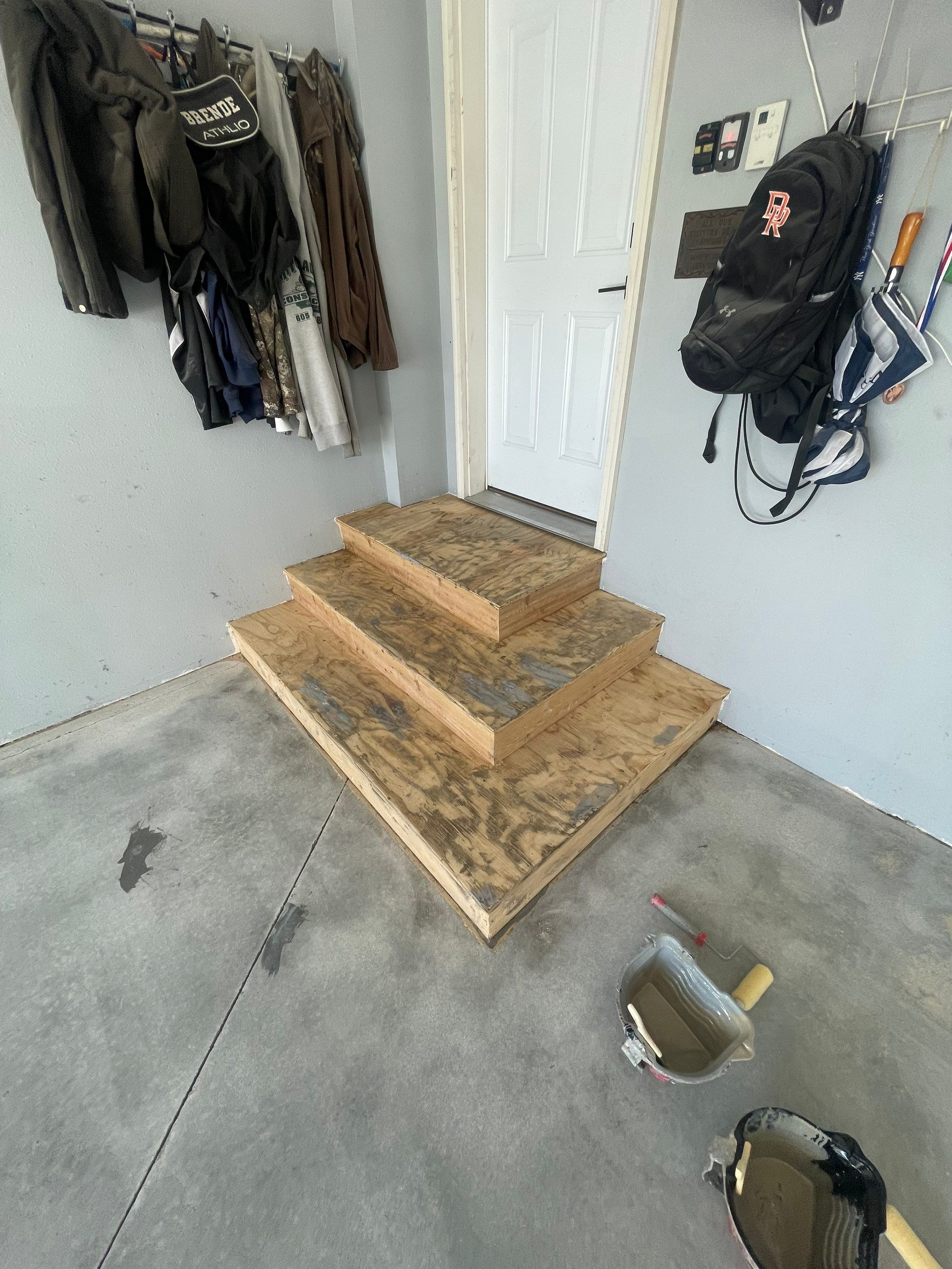 Full Garage Floor Epoxy Coating Installation in Dell Rapids by Select Painting, Coatings & Garage Cabinets