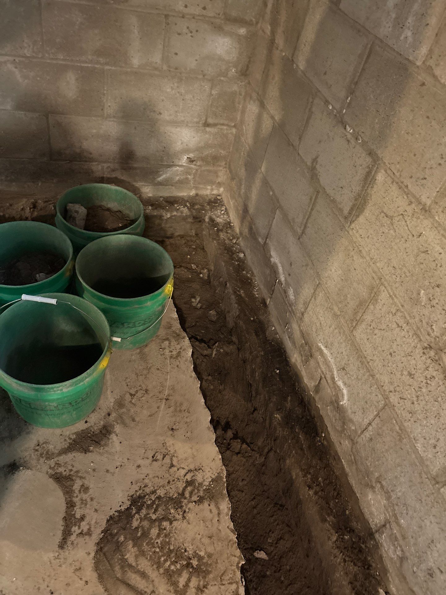 Interior Drain Tile & Buried Discharge in South Minneapolis by Waterproofing Northeast