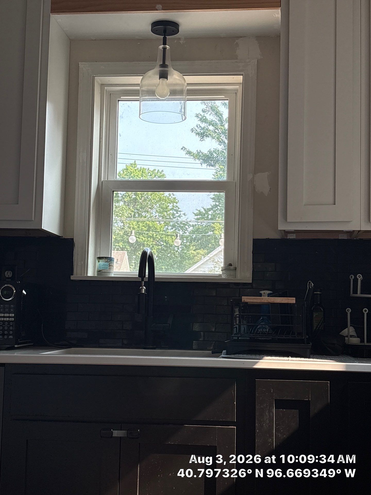 Lincoln Kitchen Remodel With Black and White Two-Tone Cabinetry by CompanyCam Sales Demo
