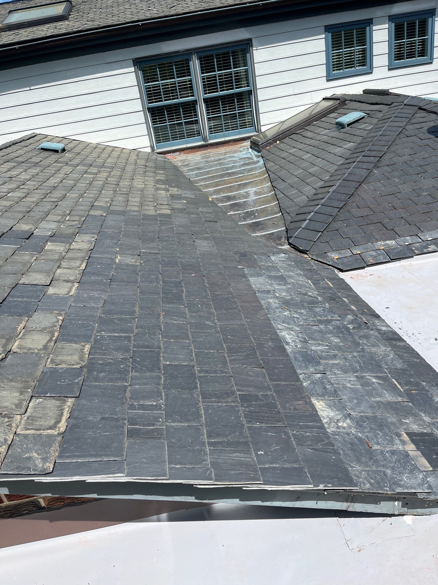 Arlington: Buckingham Slate and Carlisle Syntec TPO Roof by RM Banning, Inc.