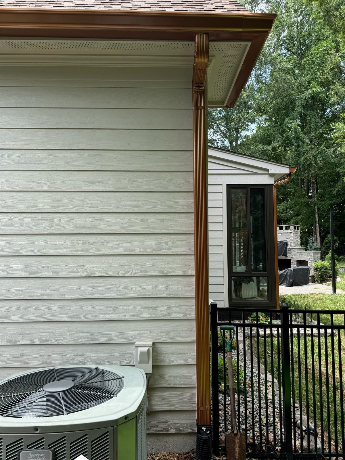 Roof Replacement - GAF Timberline HDZ Shakewood - 6” coppertone seamless gutters by Pro Performance Roofing