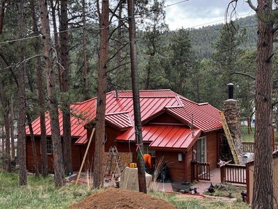 Residential Roofing Installation using Standing Seam Metal