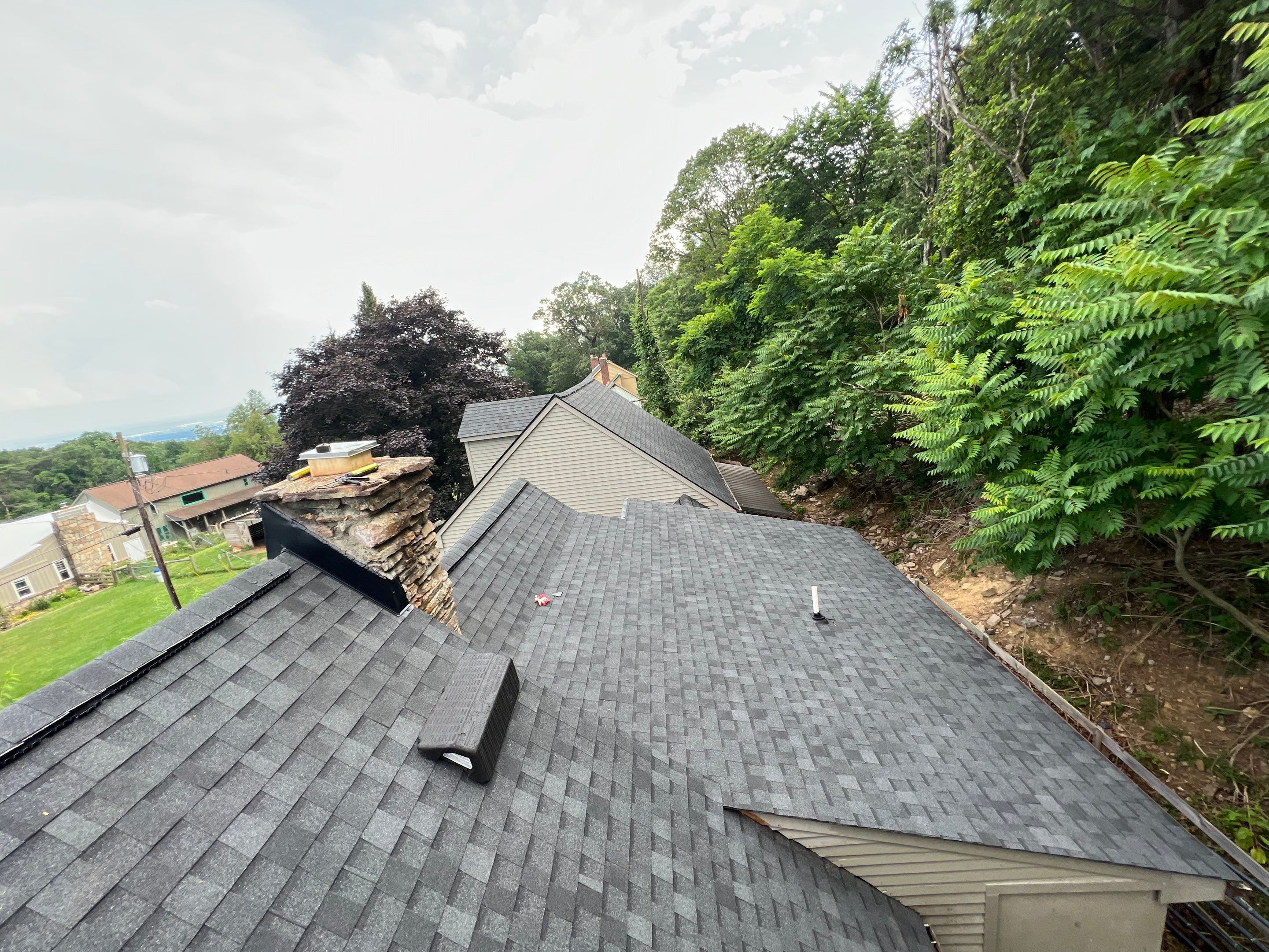 Residential Roofing Installation using Atlas Pinnacle Pristine Black Architectural Shingles by Frederick Roof Repair