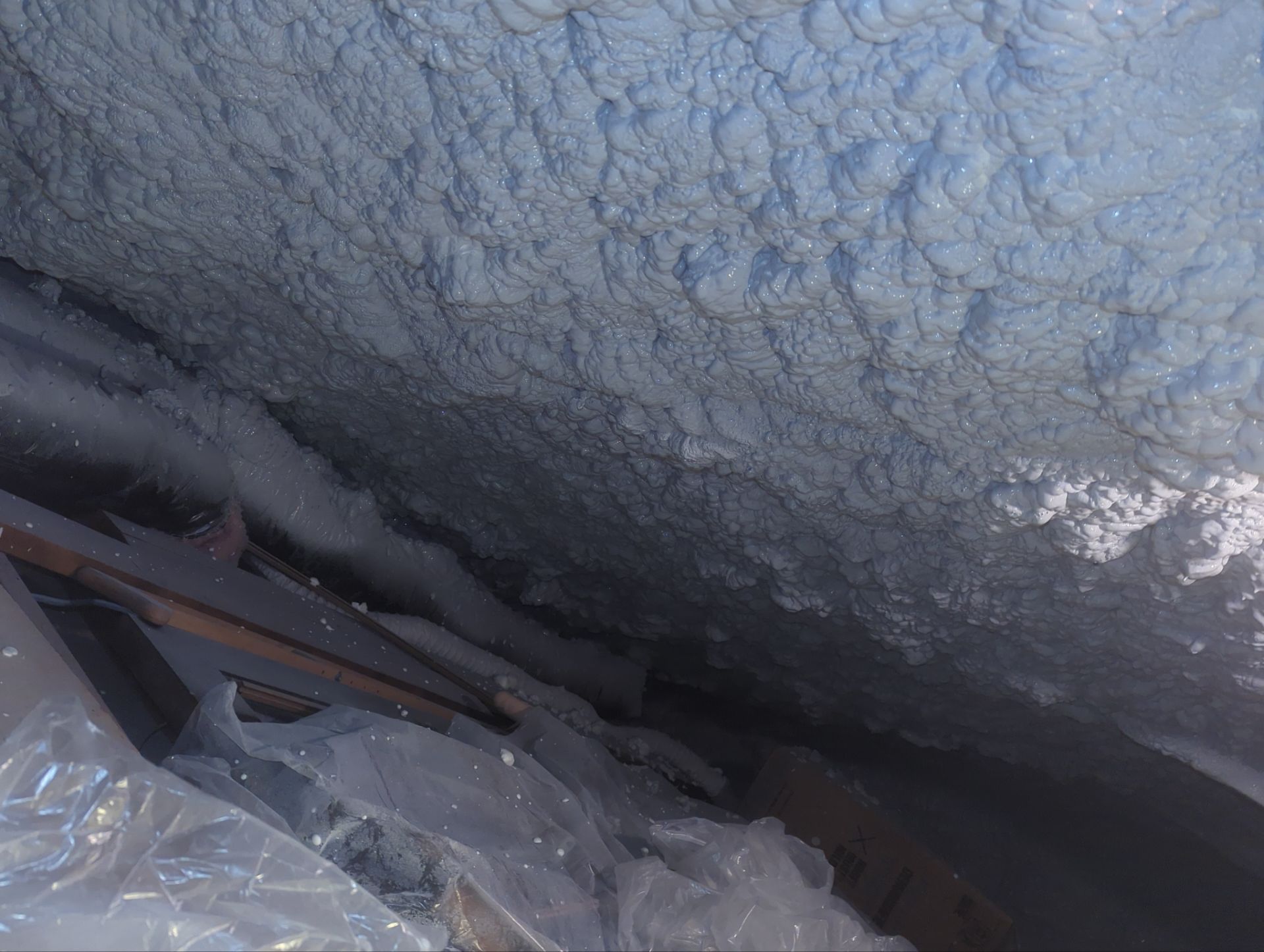 Attic Retrofit using open cell spray foam by NYS Foam & Energy