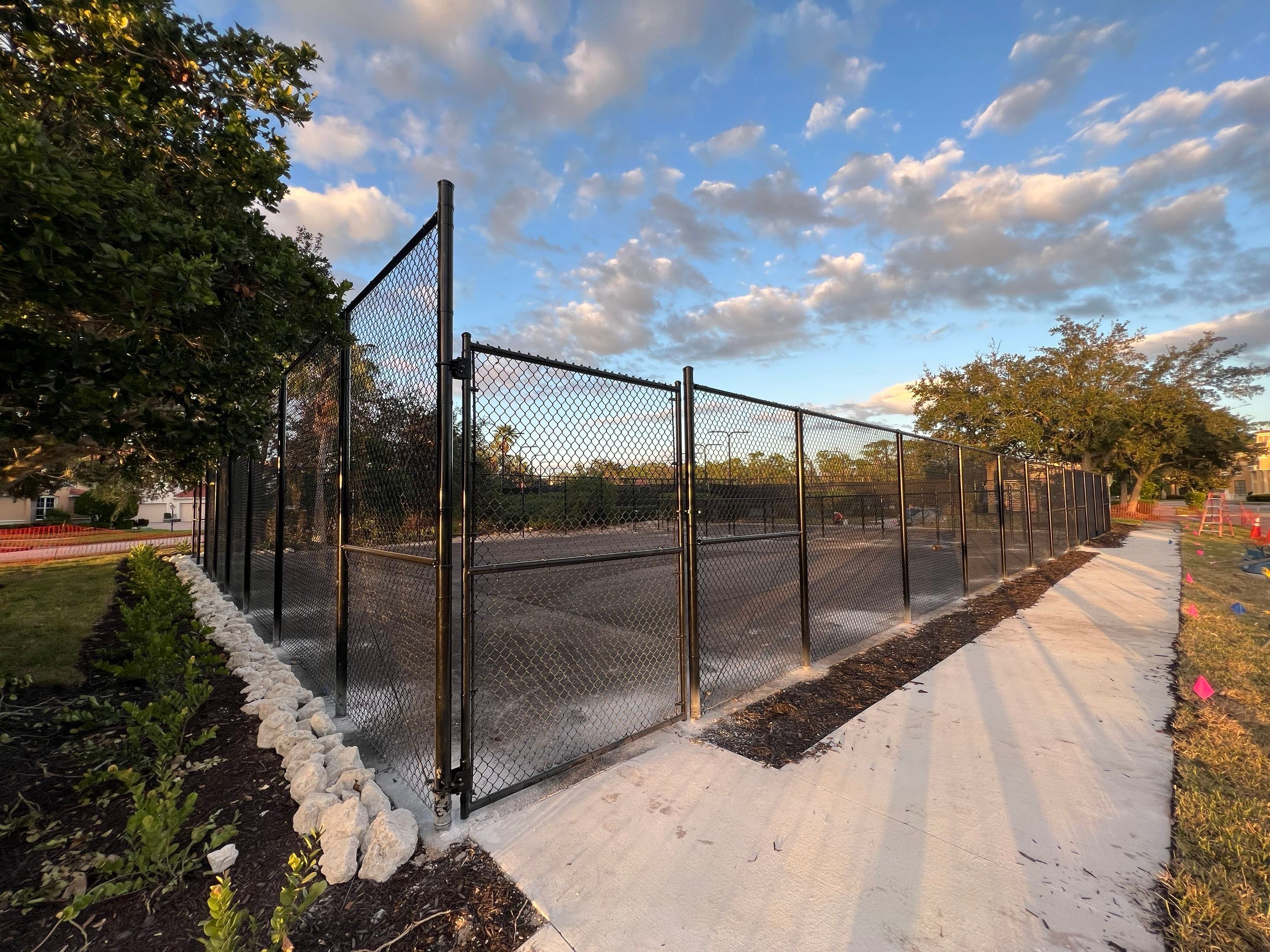 Chain-link Fence Installation using 8Ft Tall Black Chainlink Fence by Asap fence and gates, LLC