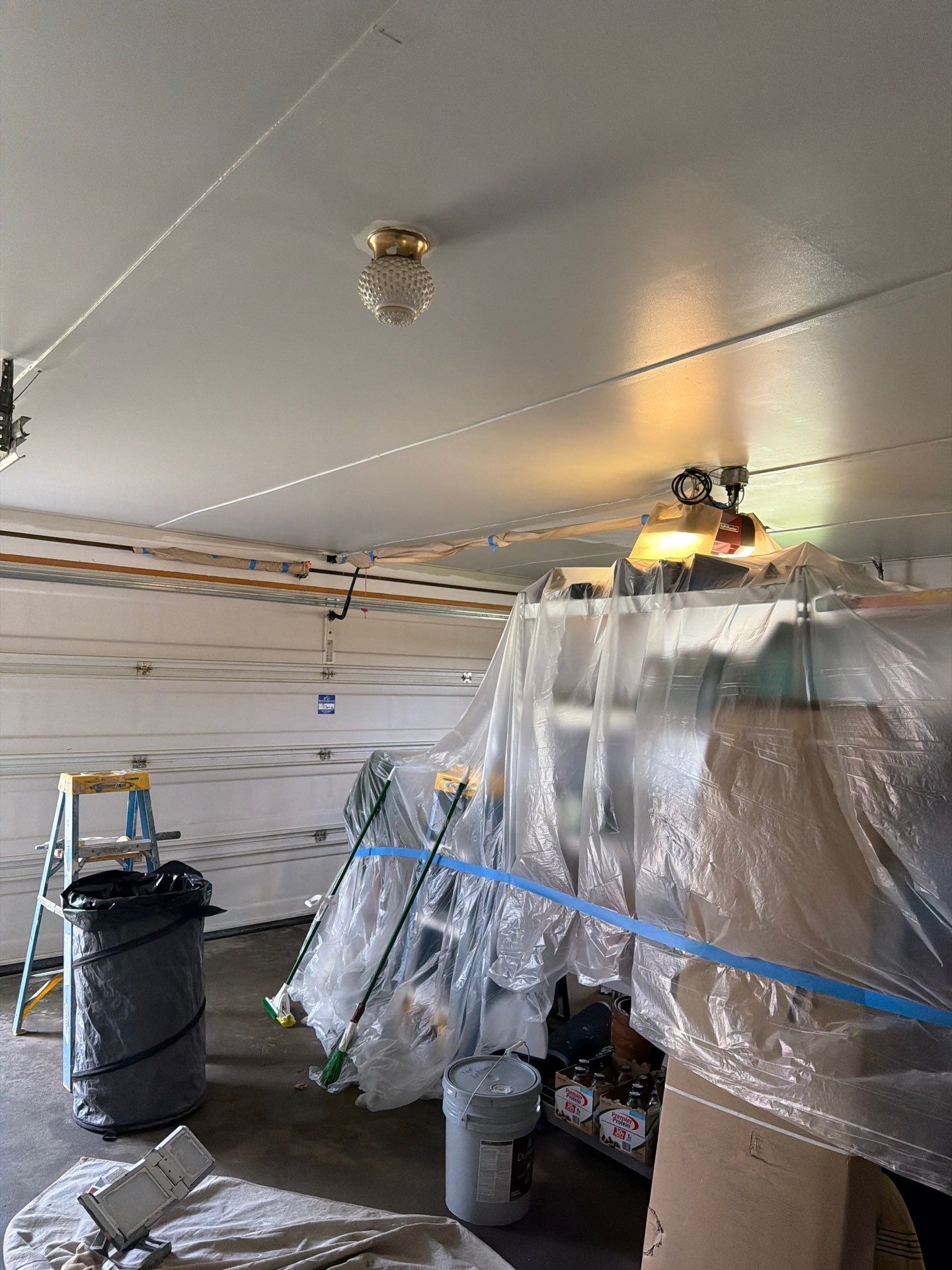 Muskegon Garage Interior Painting and Epoxy Flake Floor Installation by Gordon Painting