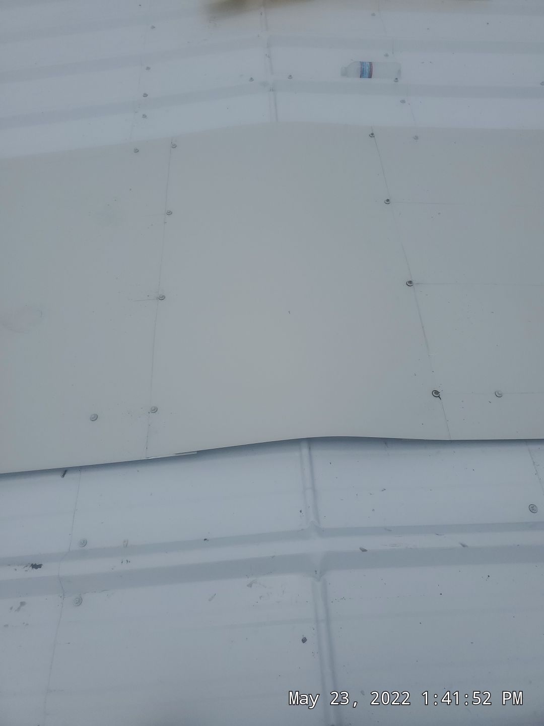 Commercial Roofing Installation using Aluminum Roofing panels by Hostetler Roofing