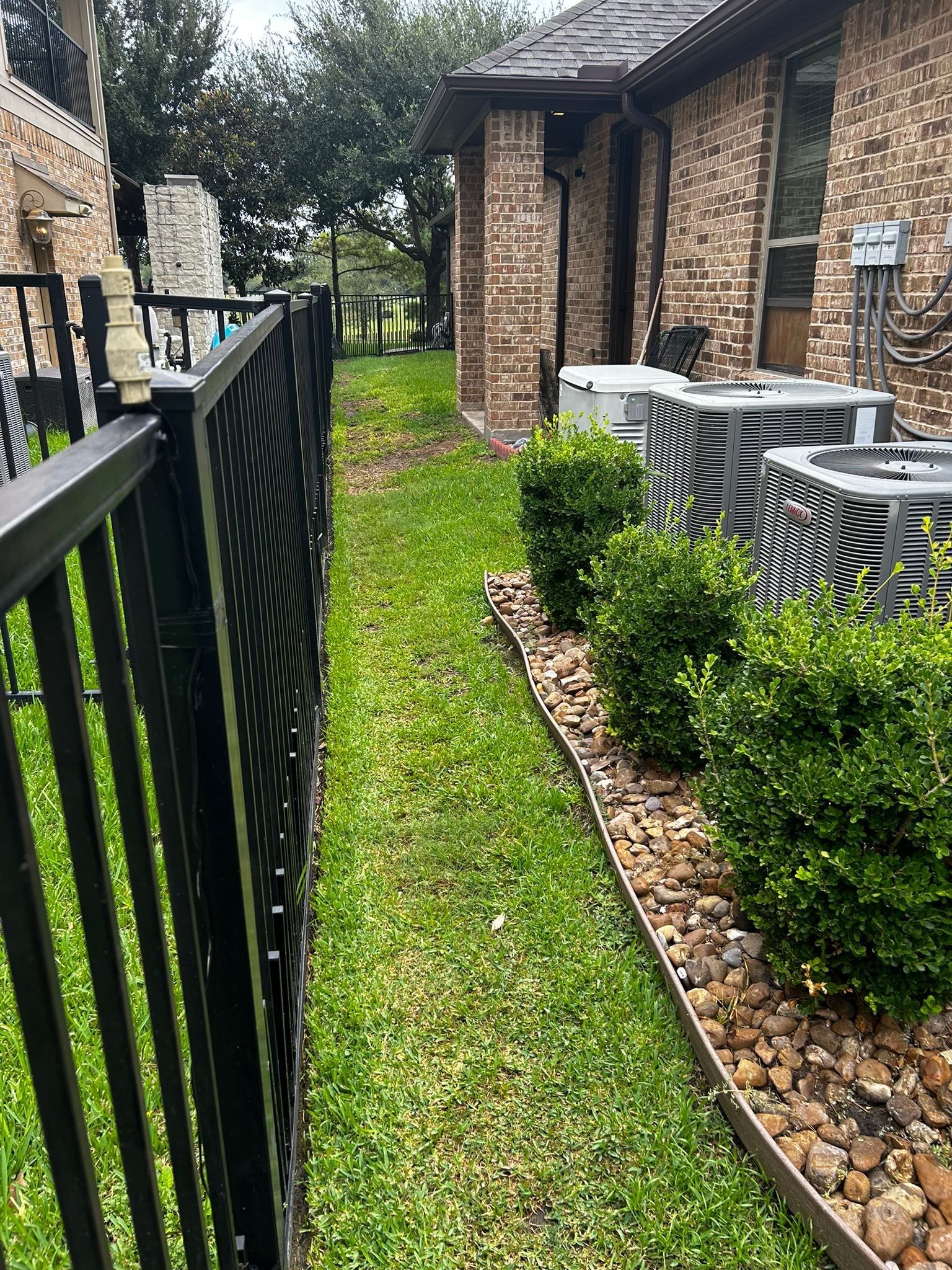 Say Goodbye to Soggy Sides: Artificial Turf & Drainage for Austin Freeman! πΏπ§ by Texas Urban Elements