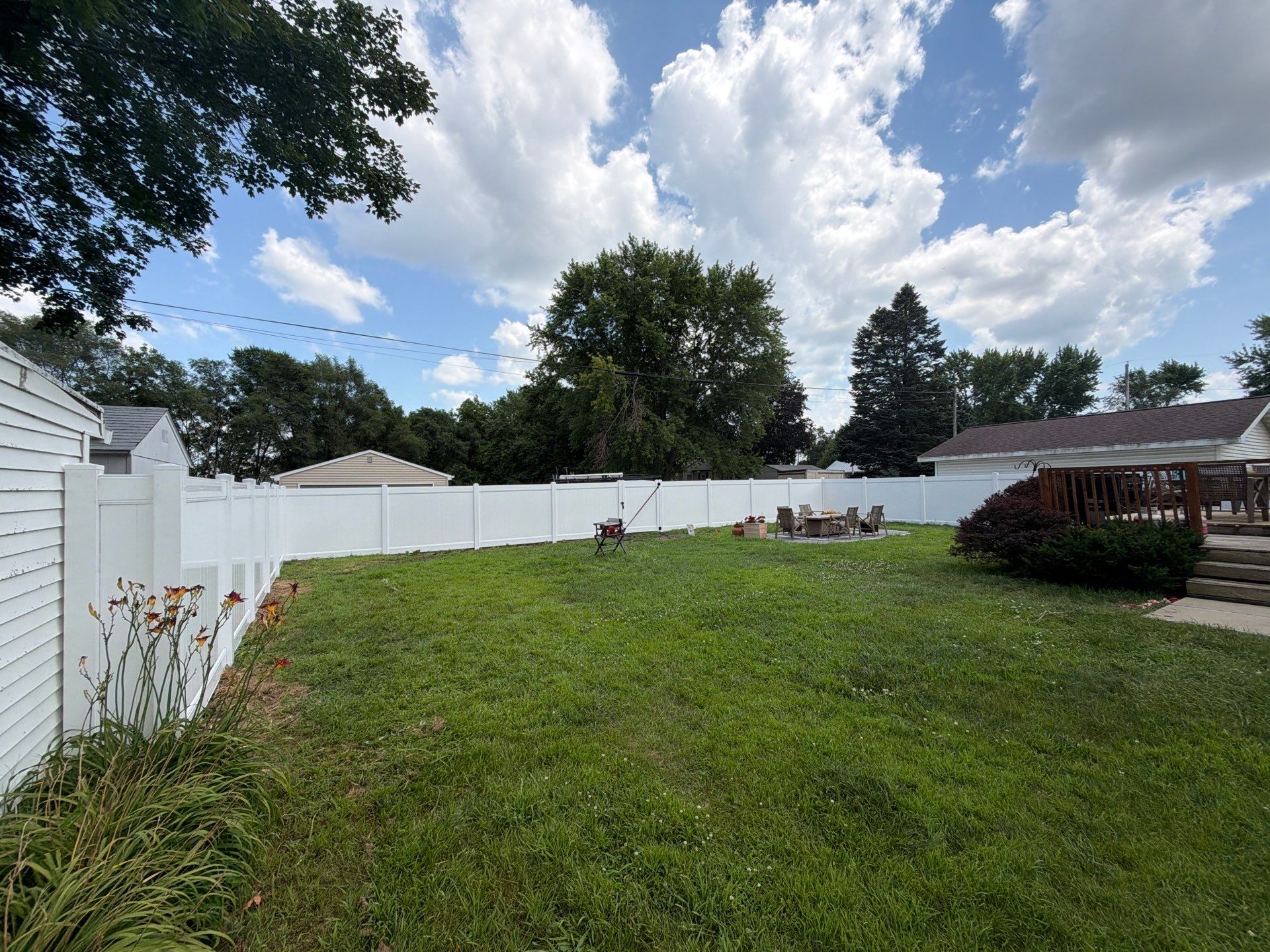 White Vinyl Privacy Fence Installation in Waterloo, Iowa by Perfect Picket Fence and Stain