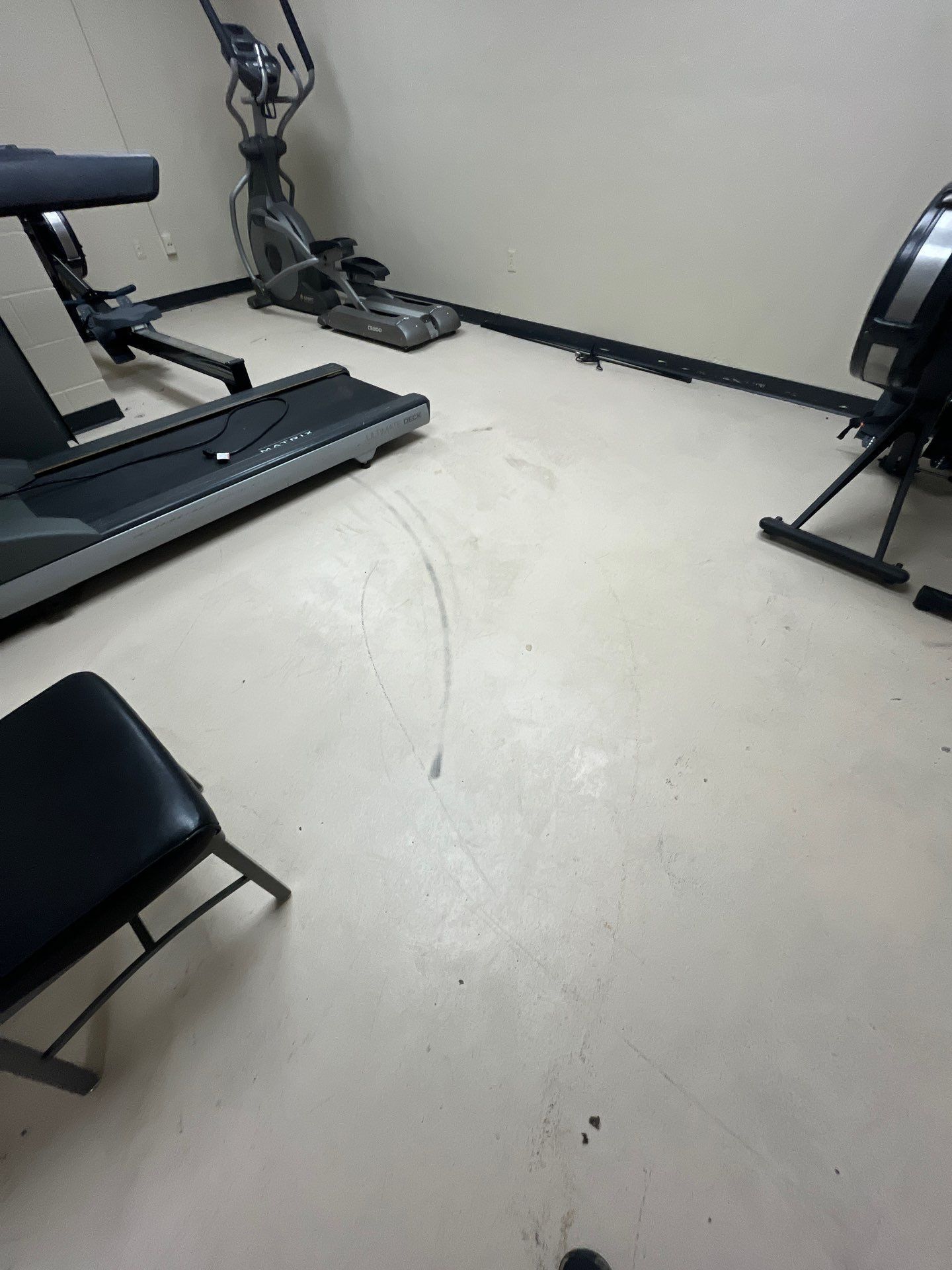 Industrial Flake Epoxy Floor Installation at Pierre National Guard Facility by Select Painting, Coatings & Garage Cabinets