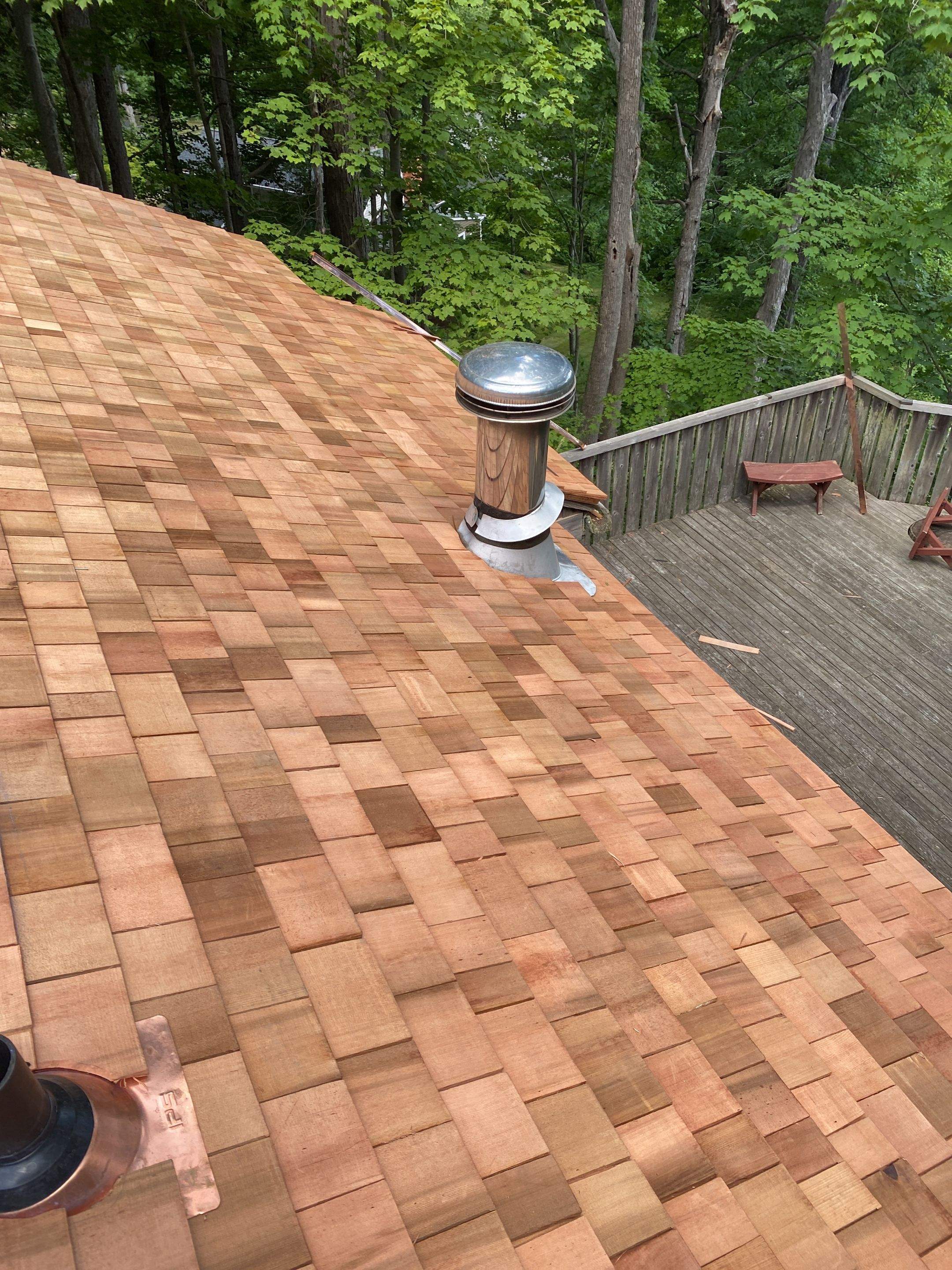 Residential Roofing Installation using Wood Shake by A Plus Exterior