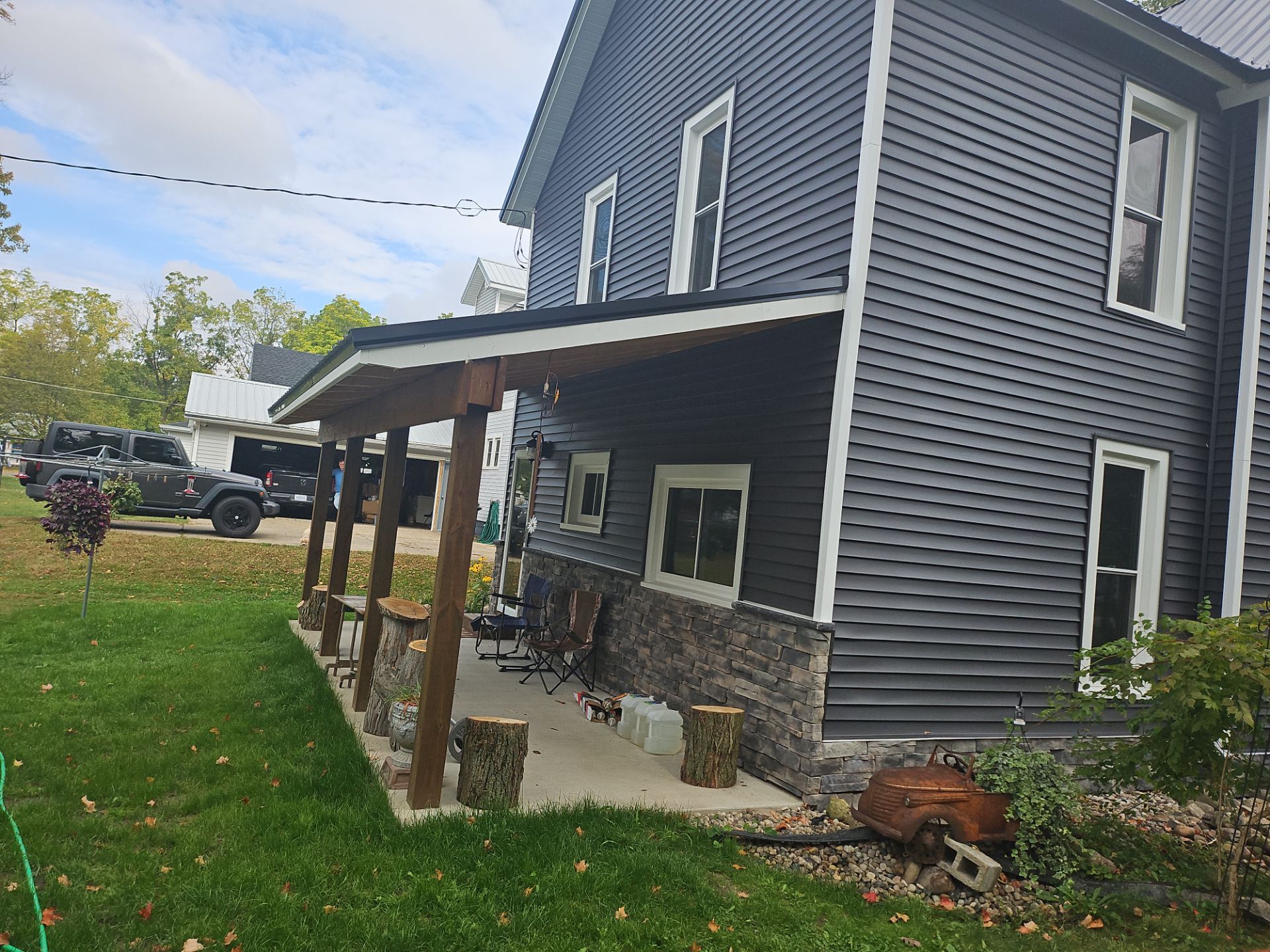 Exterior Makeover using Norandex Siding  by Energy Plus Home Improvements
