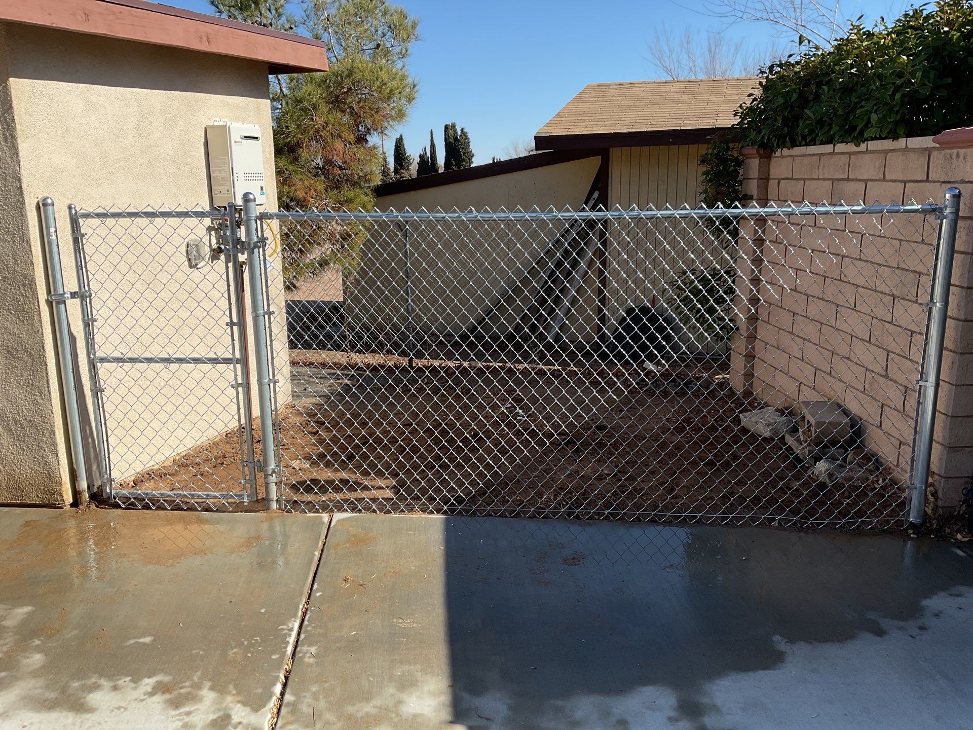 Fence Installation using chain -link by Fence Guys Inc. 