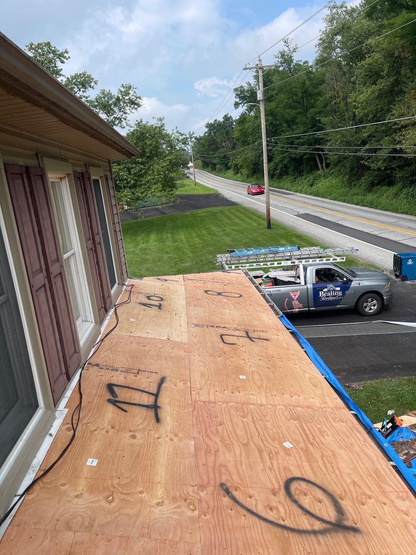 Roof Replacement and Chimney Restoration with Shutter Upgrade in East Berlin, Pennsylvania by Bealing Roofing & Exteriors
