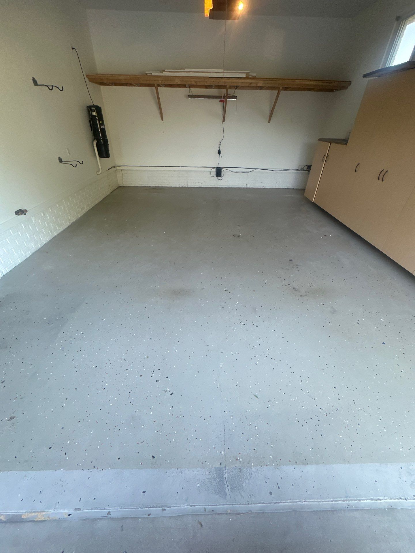 FLEXING 💪 on the Old Epoxy Coating with a Polyaspartic Coating Built to Last 💪  by Revival Concrete Coatings, LLC