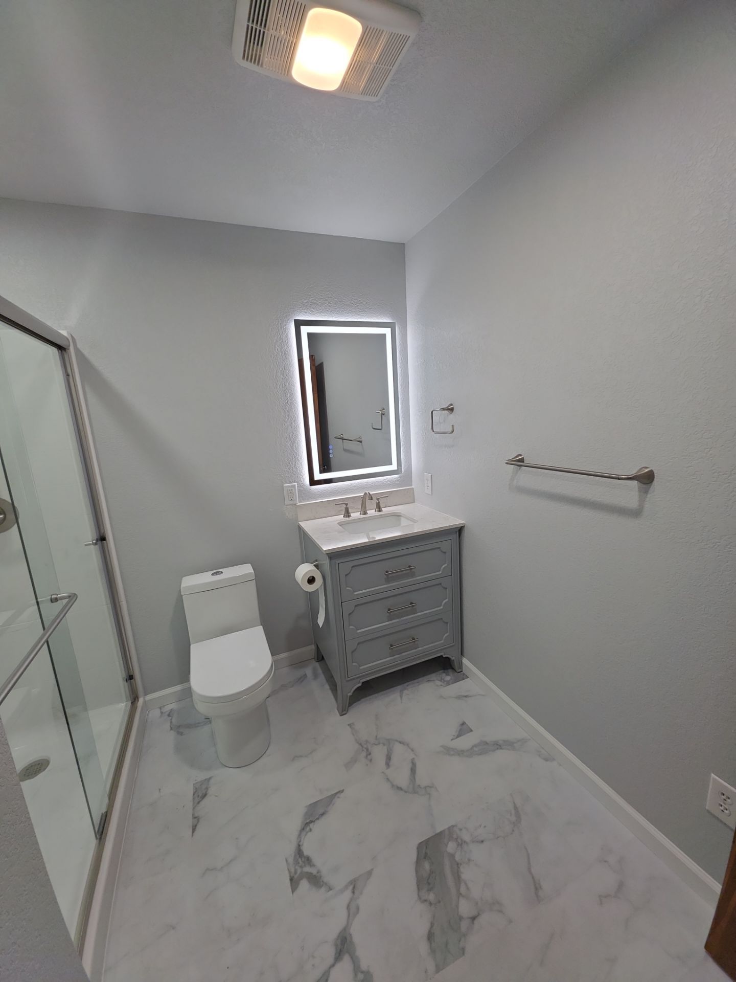 Bathroom remodel by In & Out Construction & Remodeling, LLC