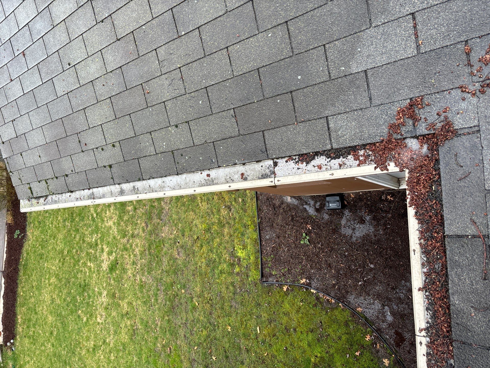 Installing new Roof and Gutter Protection after Hail Damage by Acme Exteriors