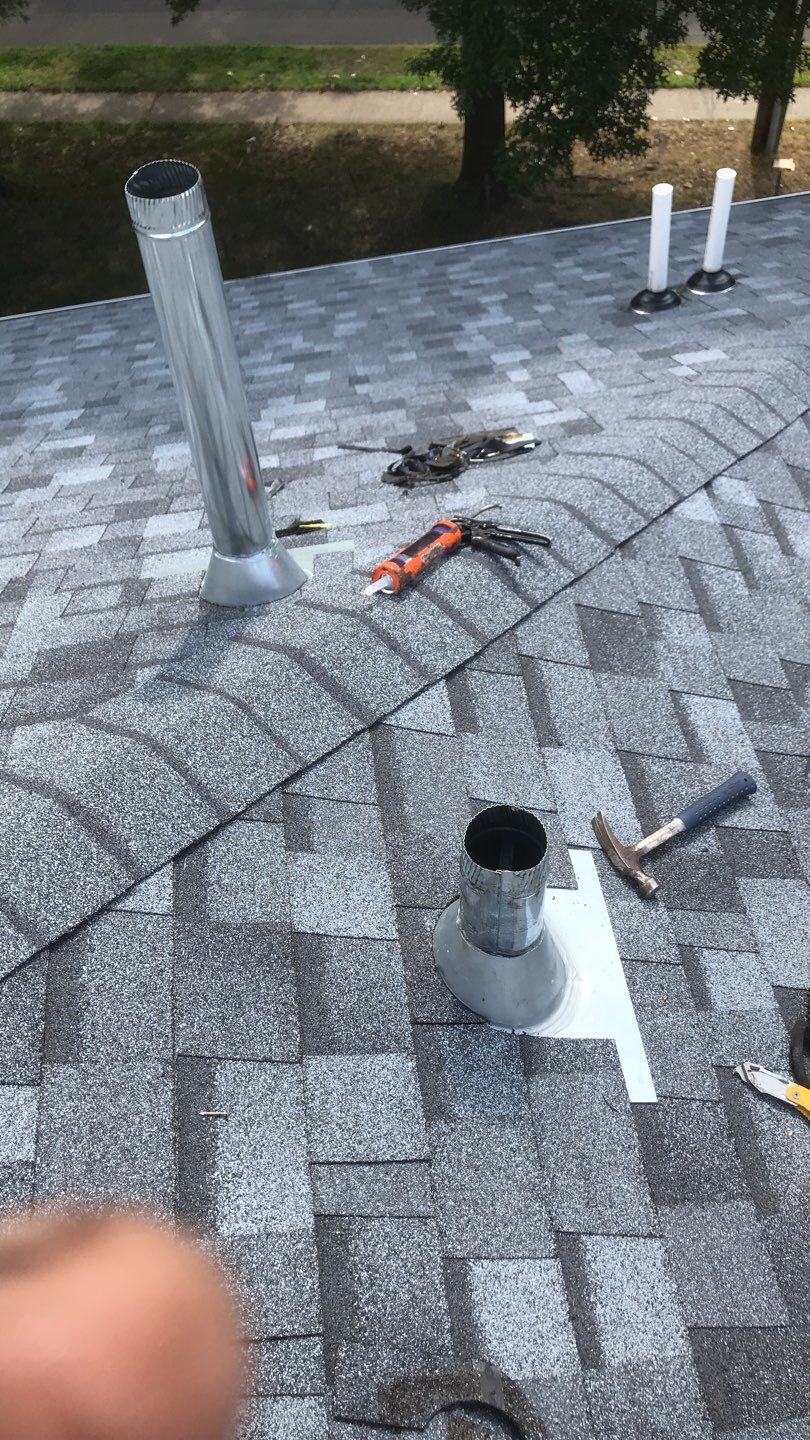 Commercial Roofing Installation using EPDM with white gutters by A Plus Exterior