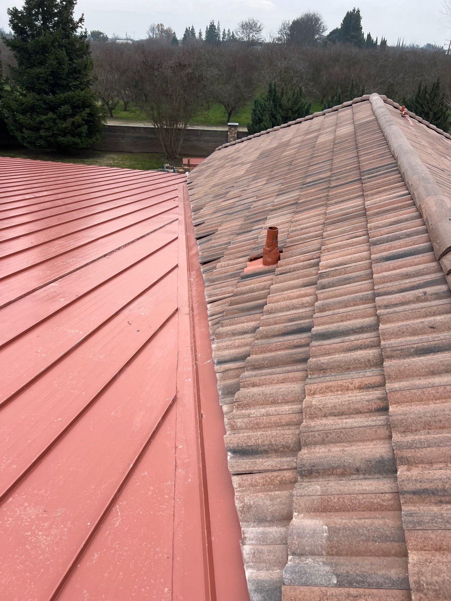 Tile, Metal, and TPO roofing project (new construction) by Straight Edge Roofing Inc