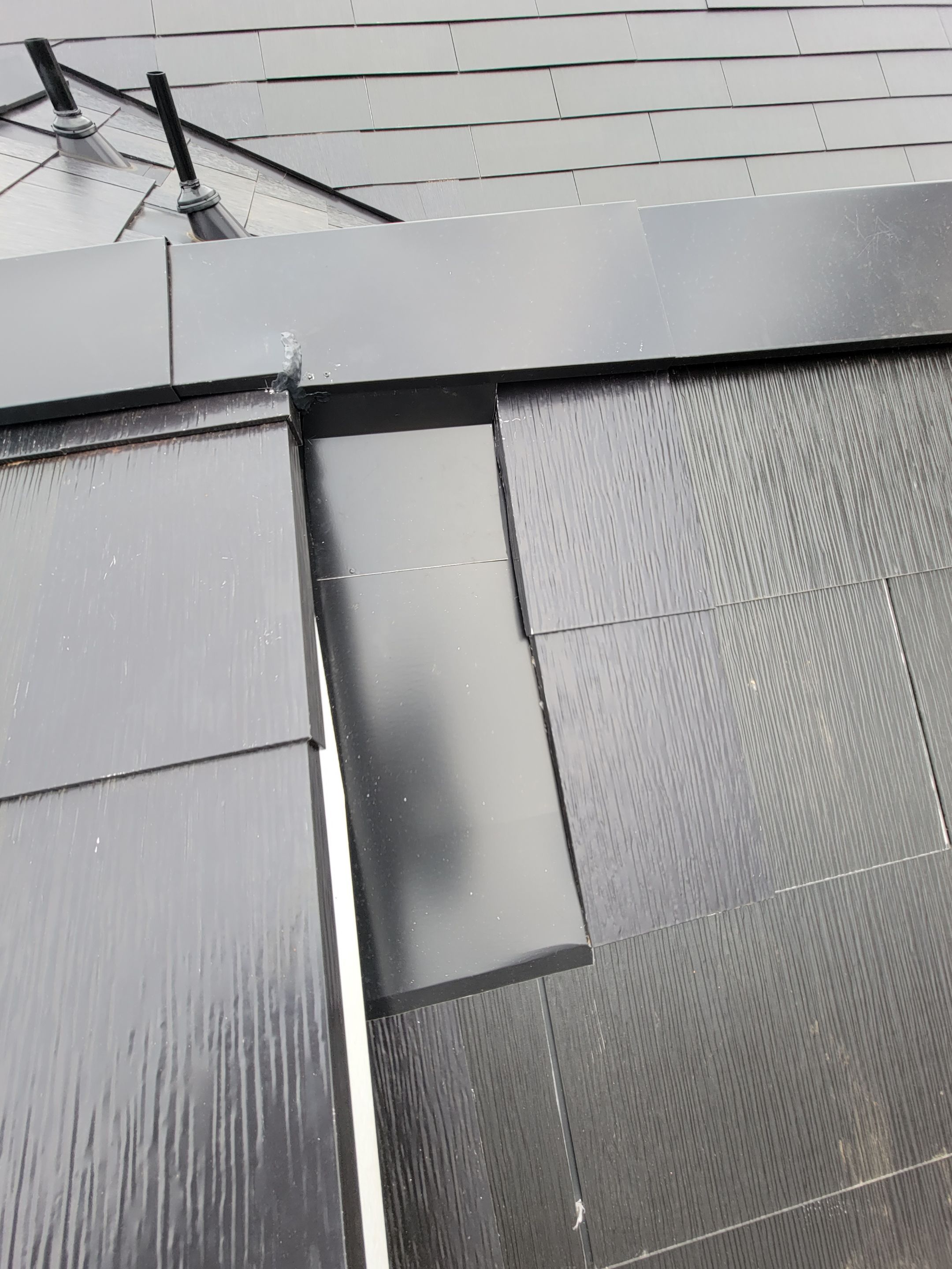 New Construction Tesla Solar Roof by American Home Contractors