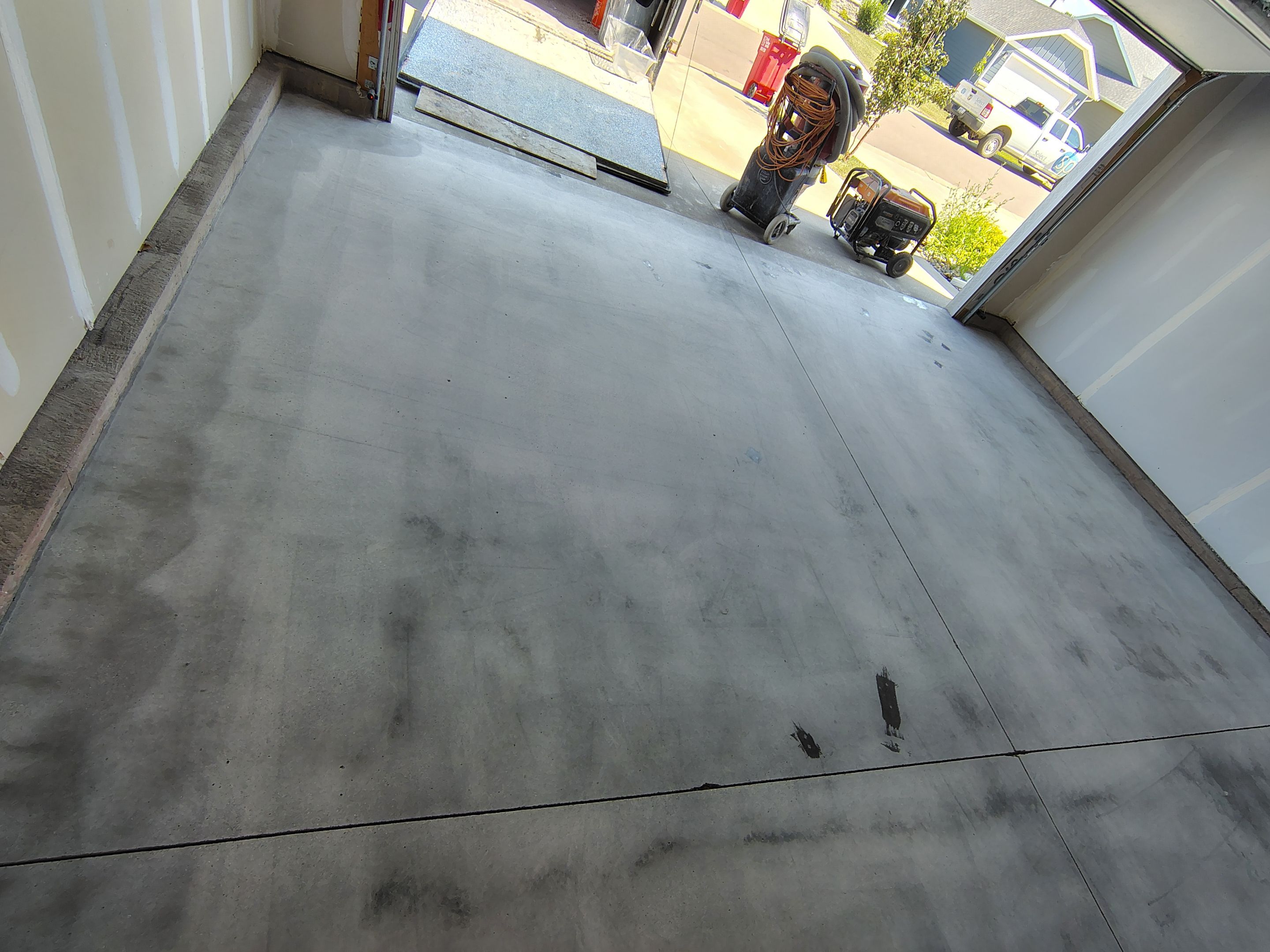 Custom Epoxy Garage Floor and Patio Coating in Sioux Falls by Select Painting, Coatings & Garage Cabinets