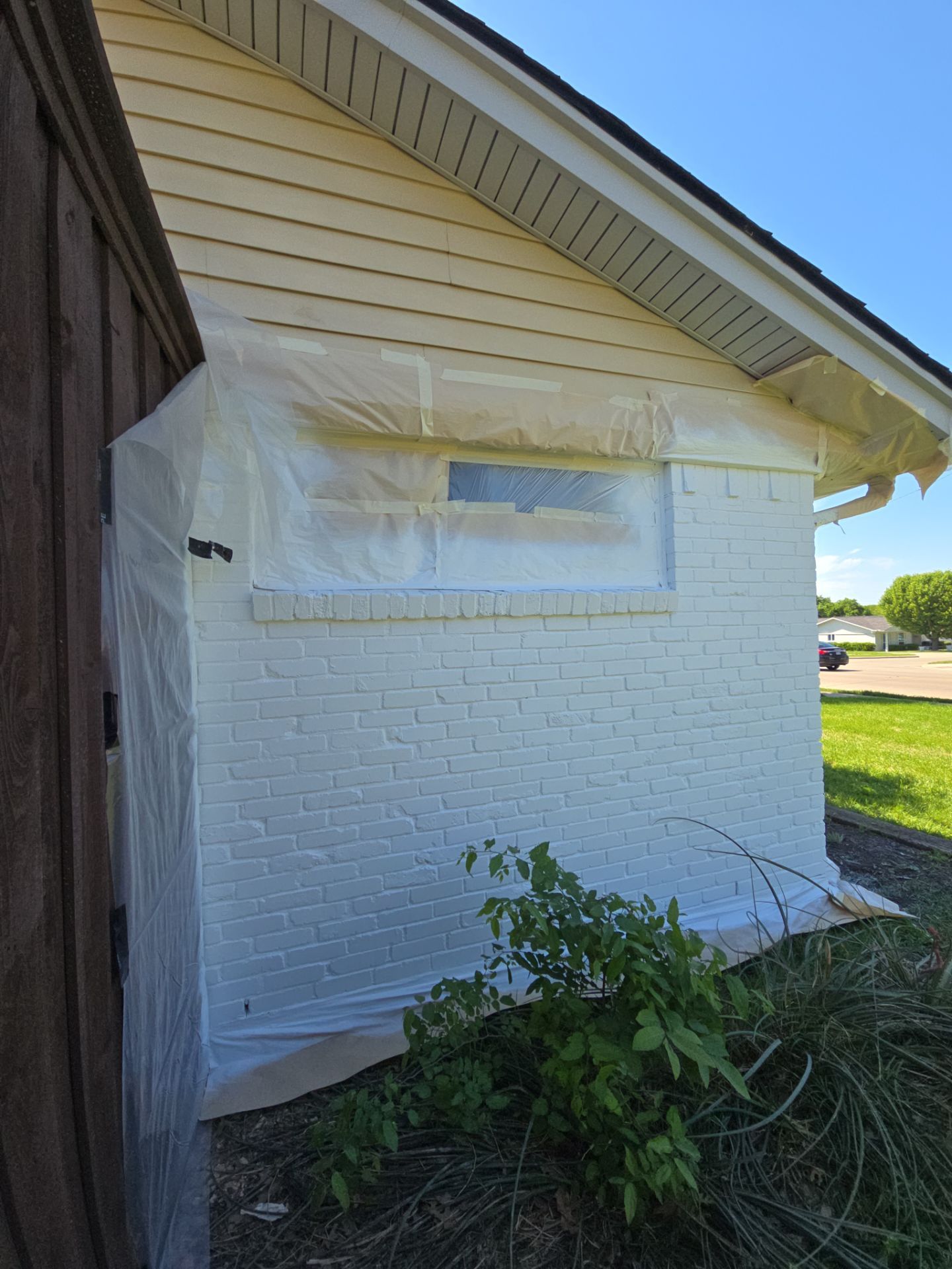 Exterior Home Paint Project with Different Surfaces by SLM General Contractors & Roofing