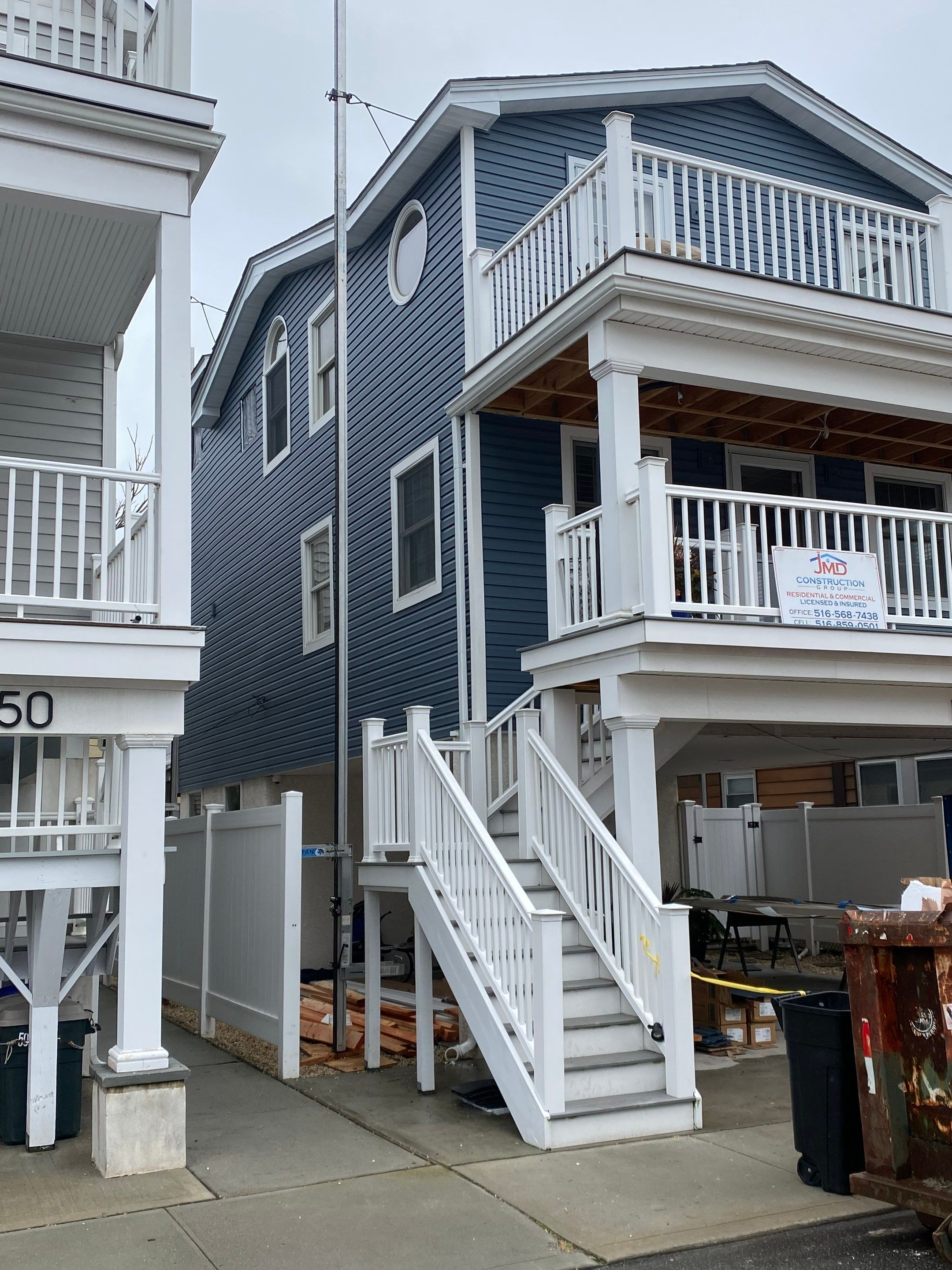 House lift in the westend of Long Beach. by Above All Gutters
