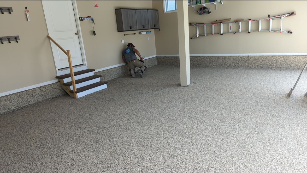 Garage using Cordwood by Select Painting, Coatings & Garage Cabinets