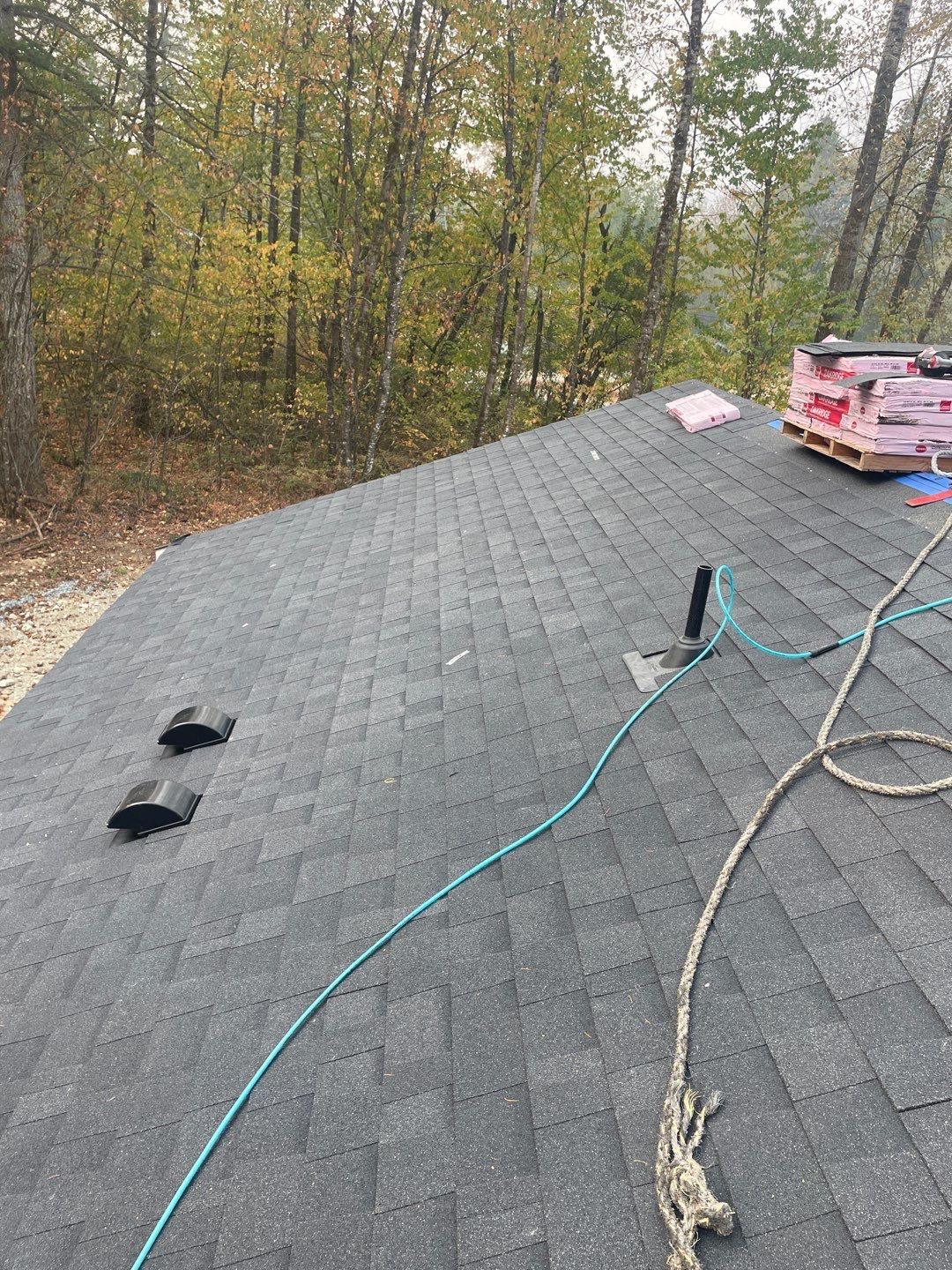 Residential Roofing Installation using OC Oakridge shingles by Top Notch Roofing Inc